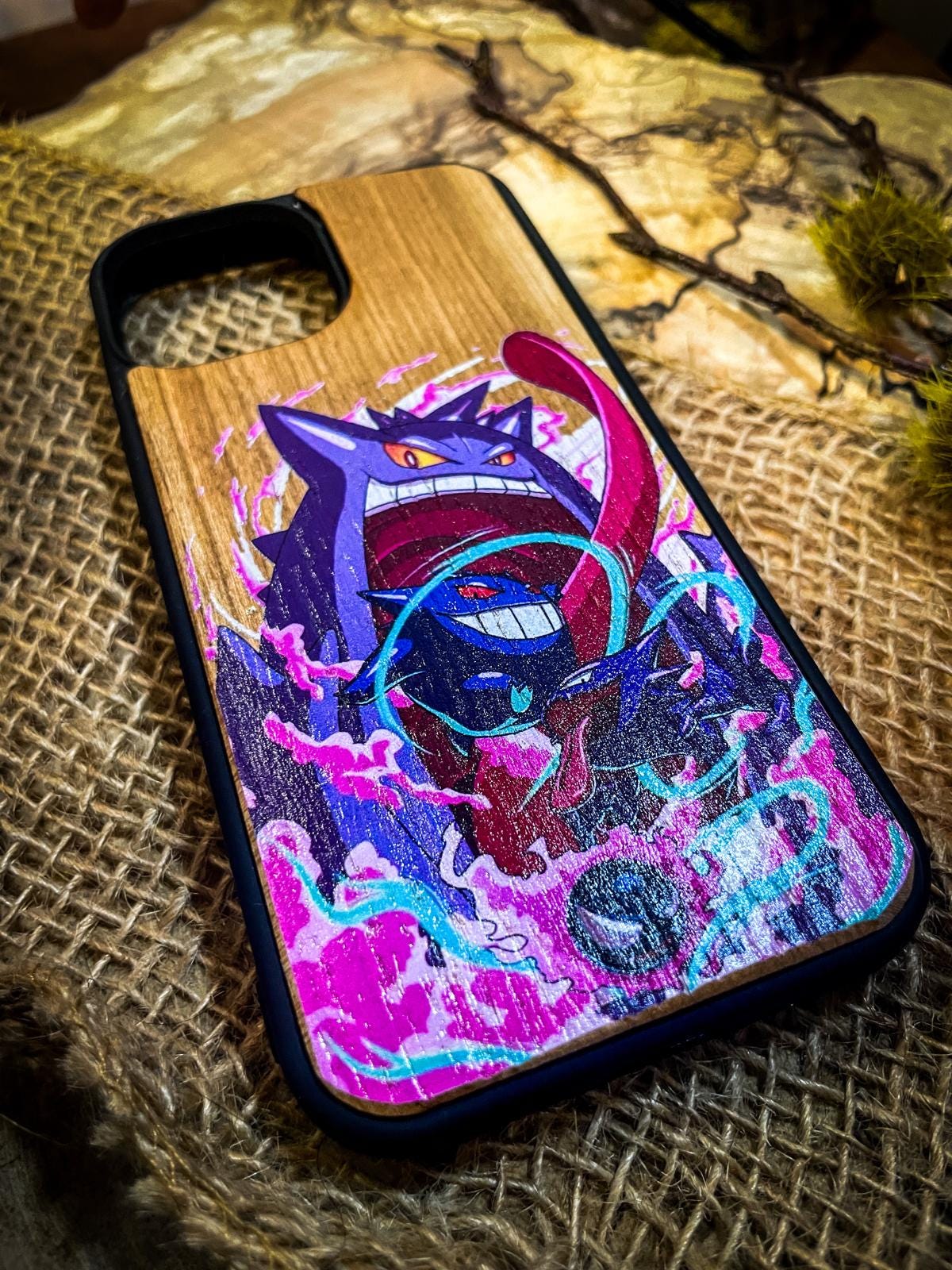 a phone case with a picture of a cat on it