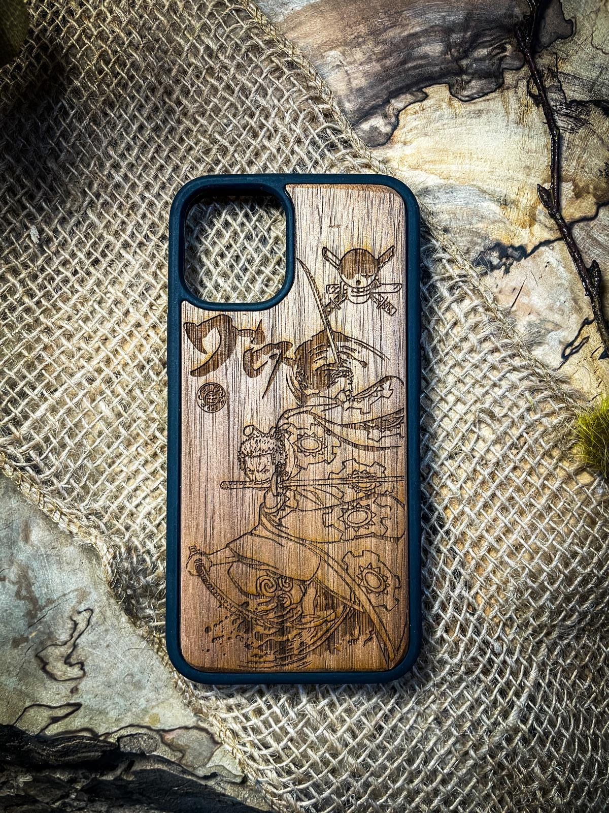 a wooden phone case with a drawing on it