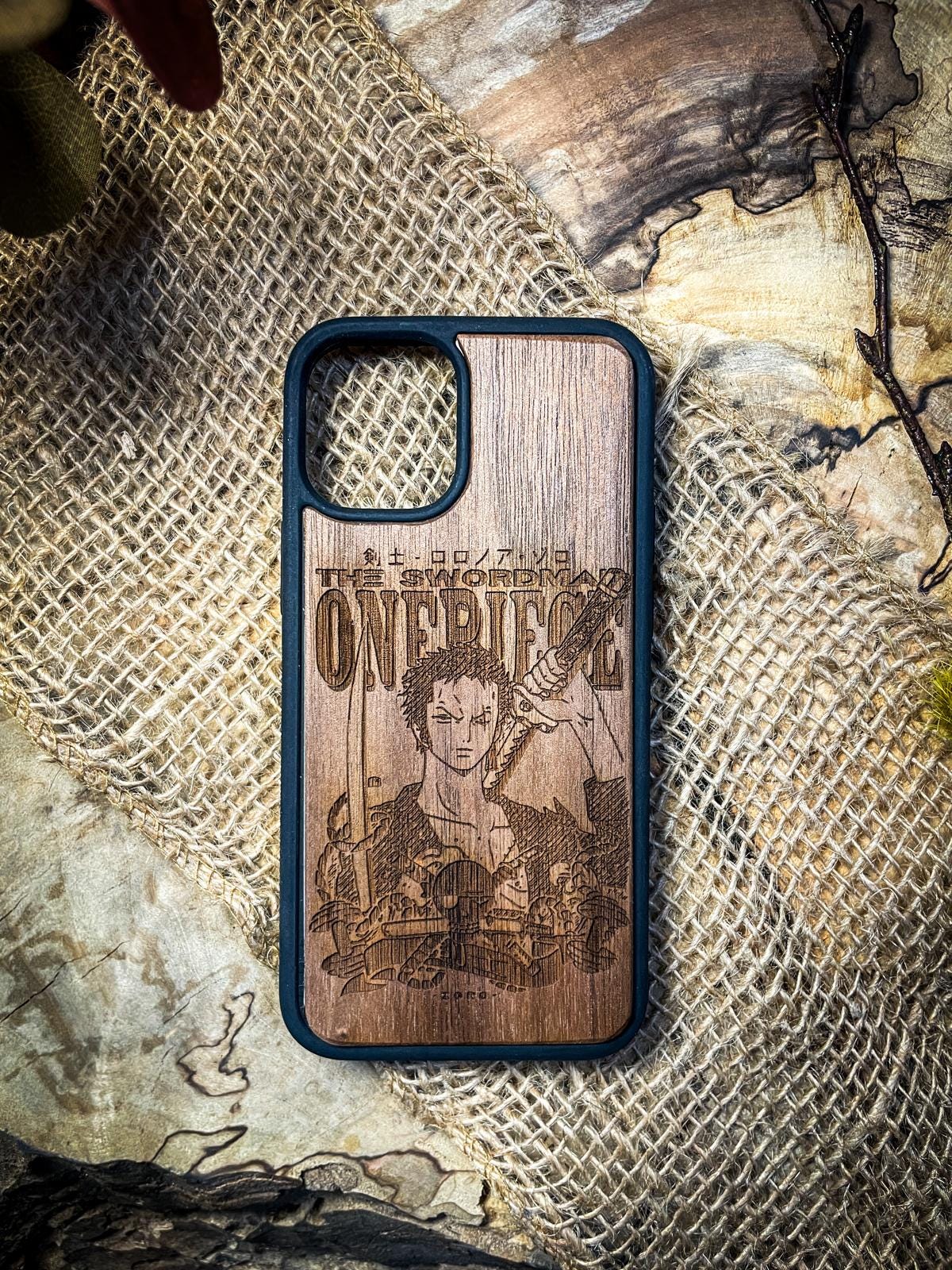 a wooden phone case with a picture of a man on it