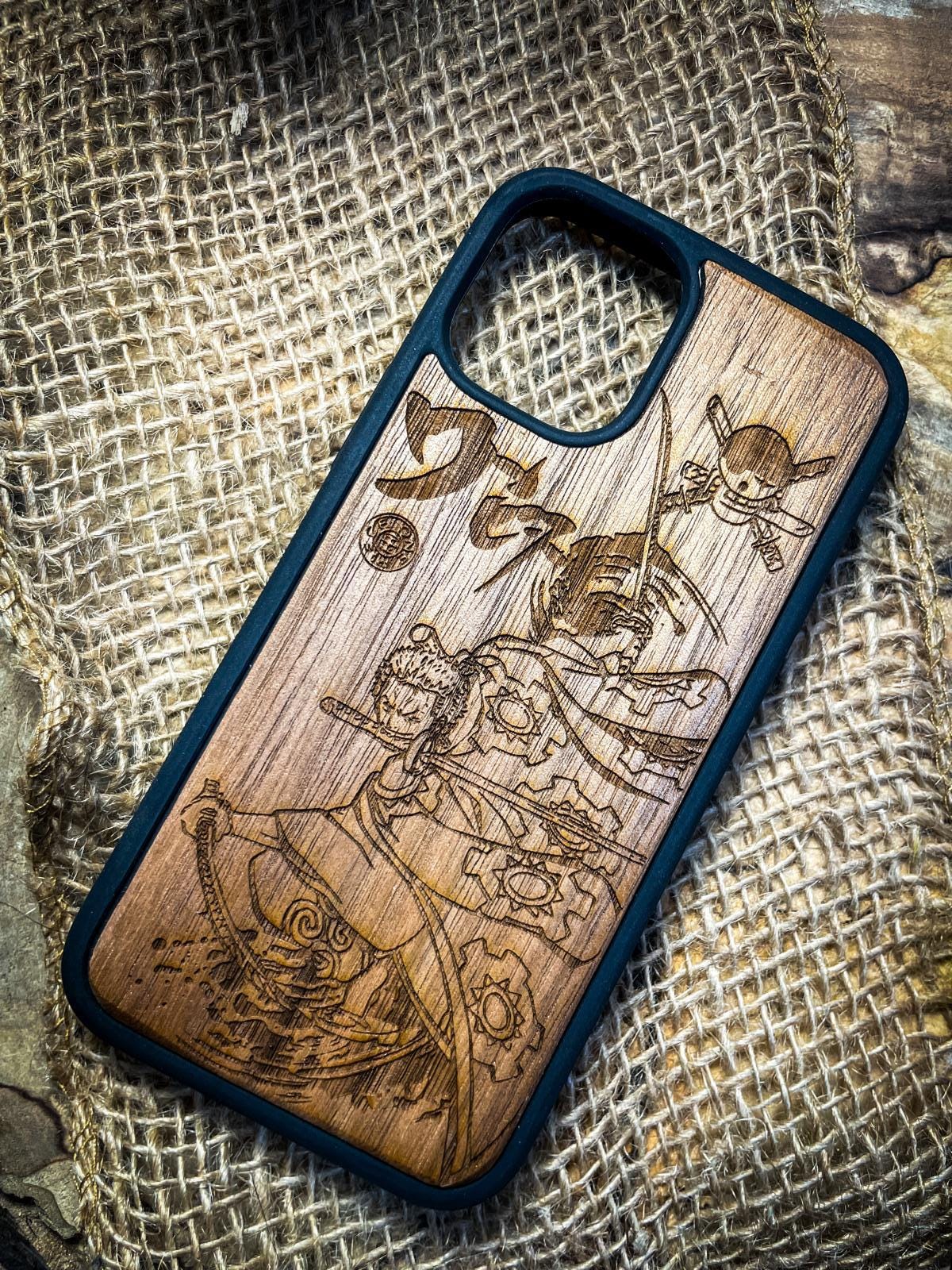 a wooden phone case with a drawing on it