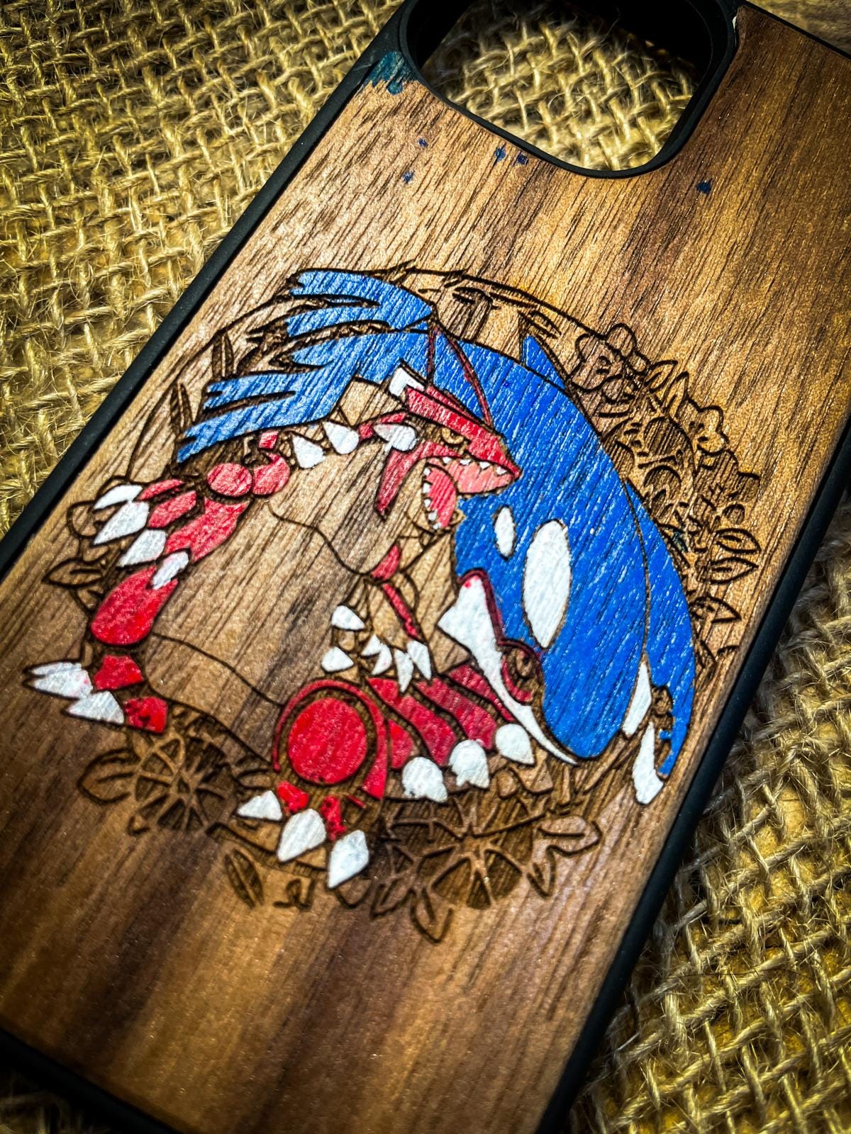 a wooden phone case with a picture of sonic the hedgehog on it