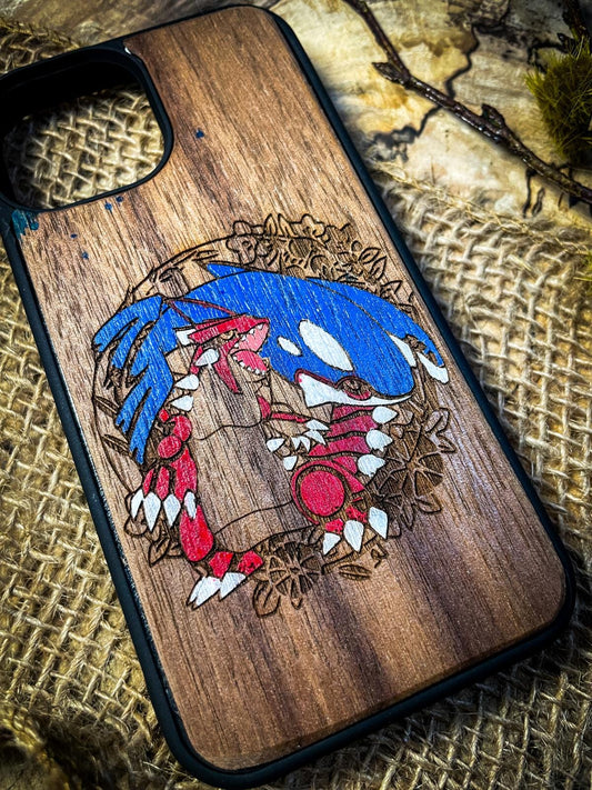 a wooden phone case with a picture of a cartoon character on it