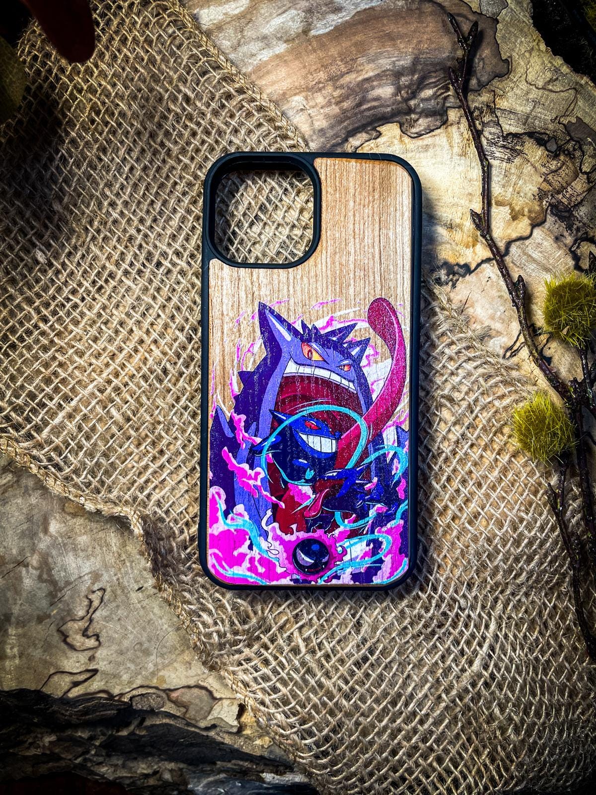 a phone case with a picture of a cat on it