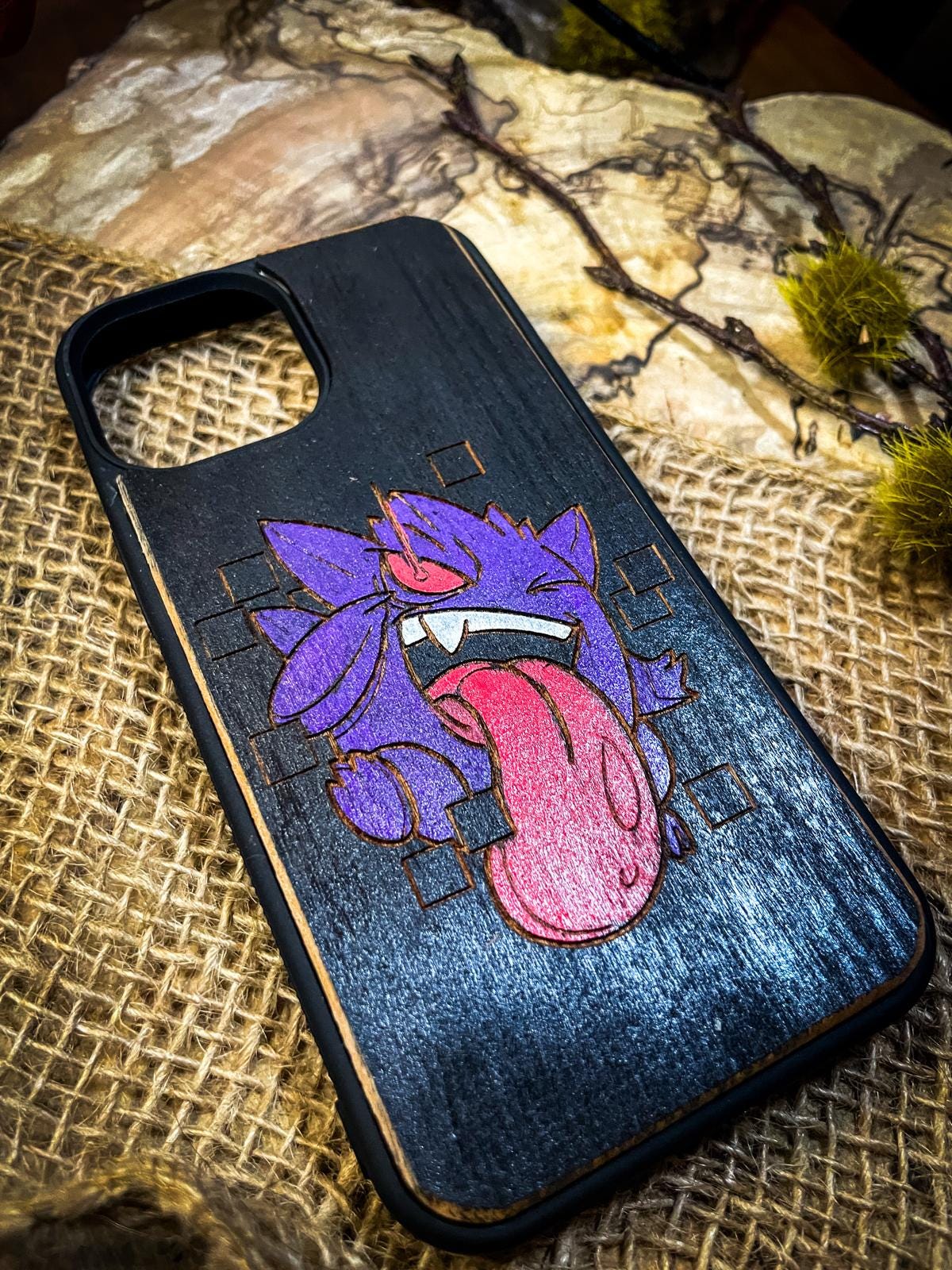 a phone case with a picture of a tongue sticking out of it