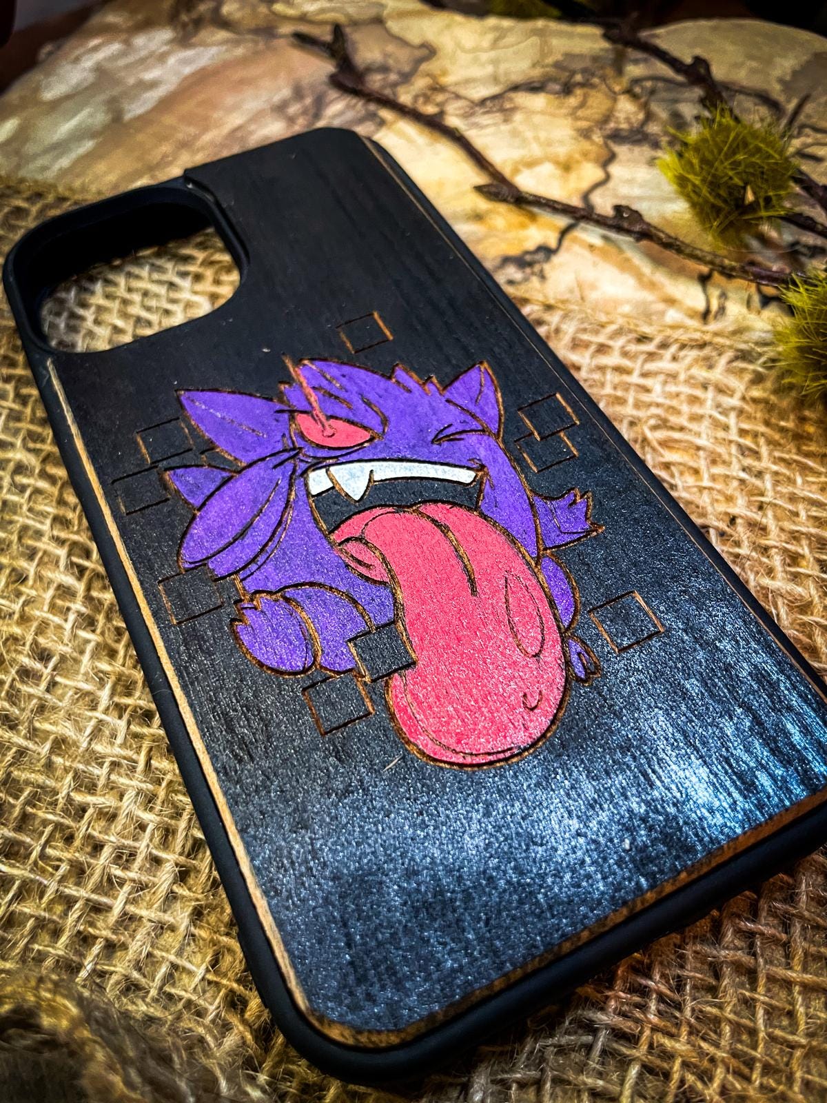 a phone case with a picture of a tongue sticking out of it