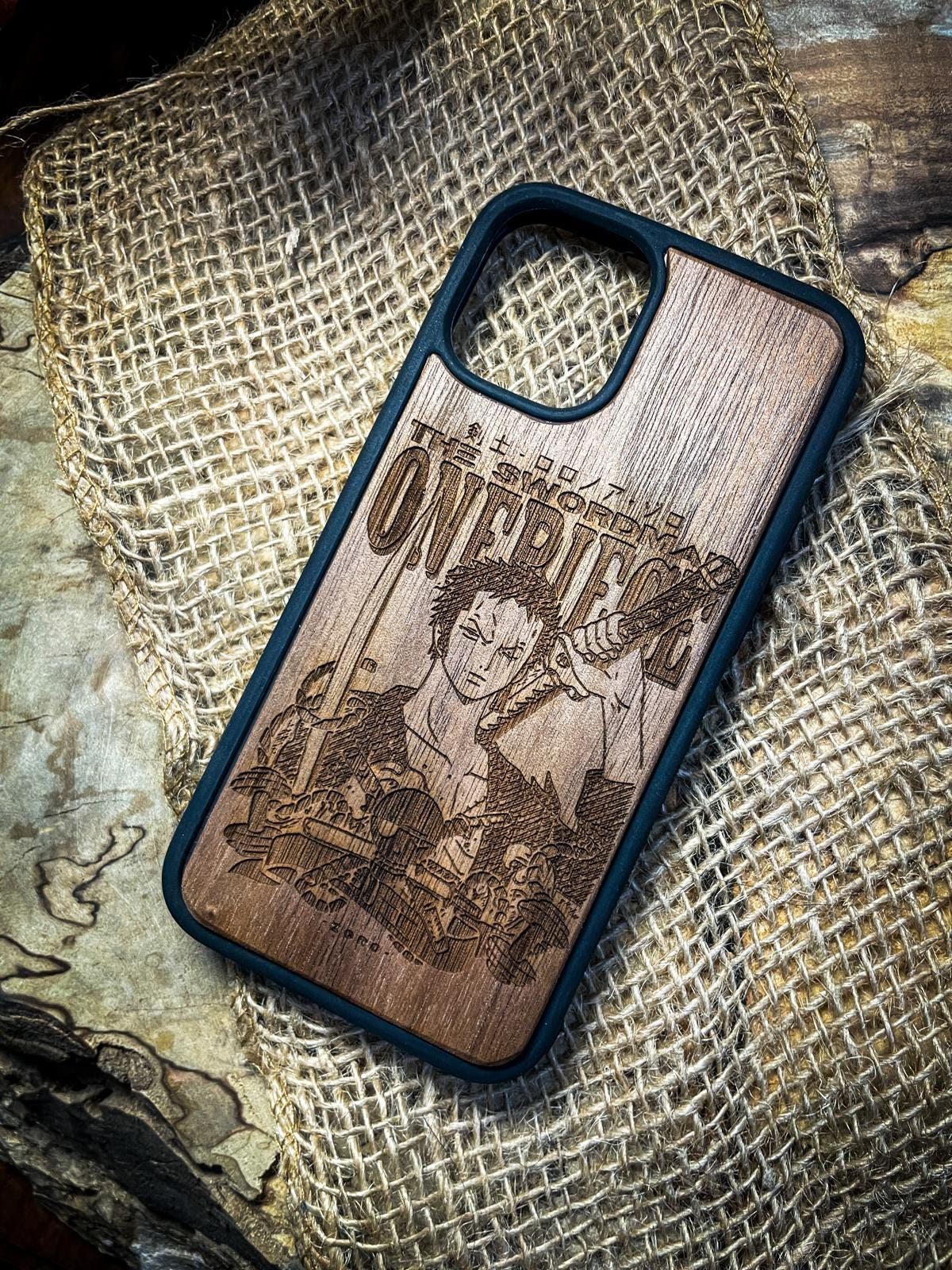 a wooden phone case with a picture of a band on it