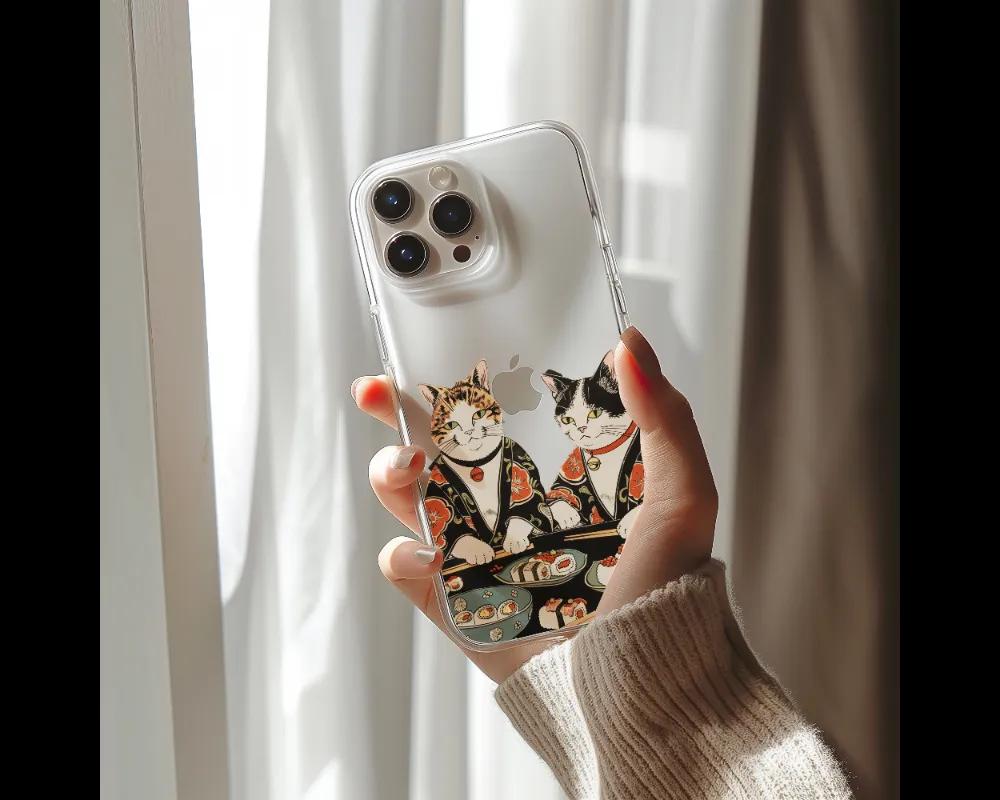 a person holding a phone case with cats on it