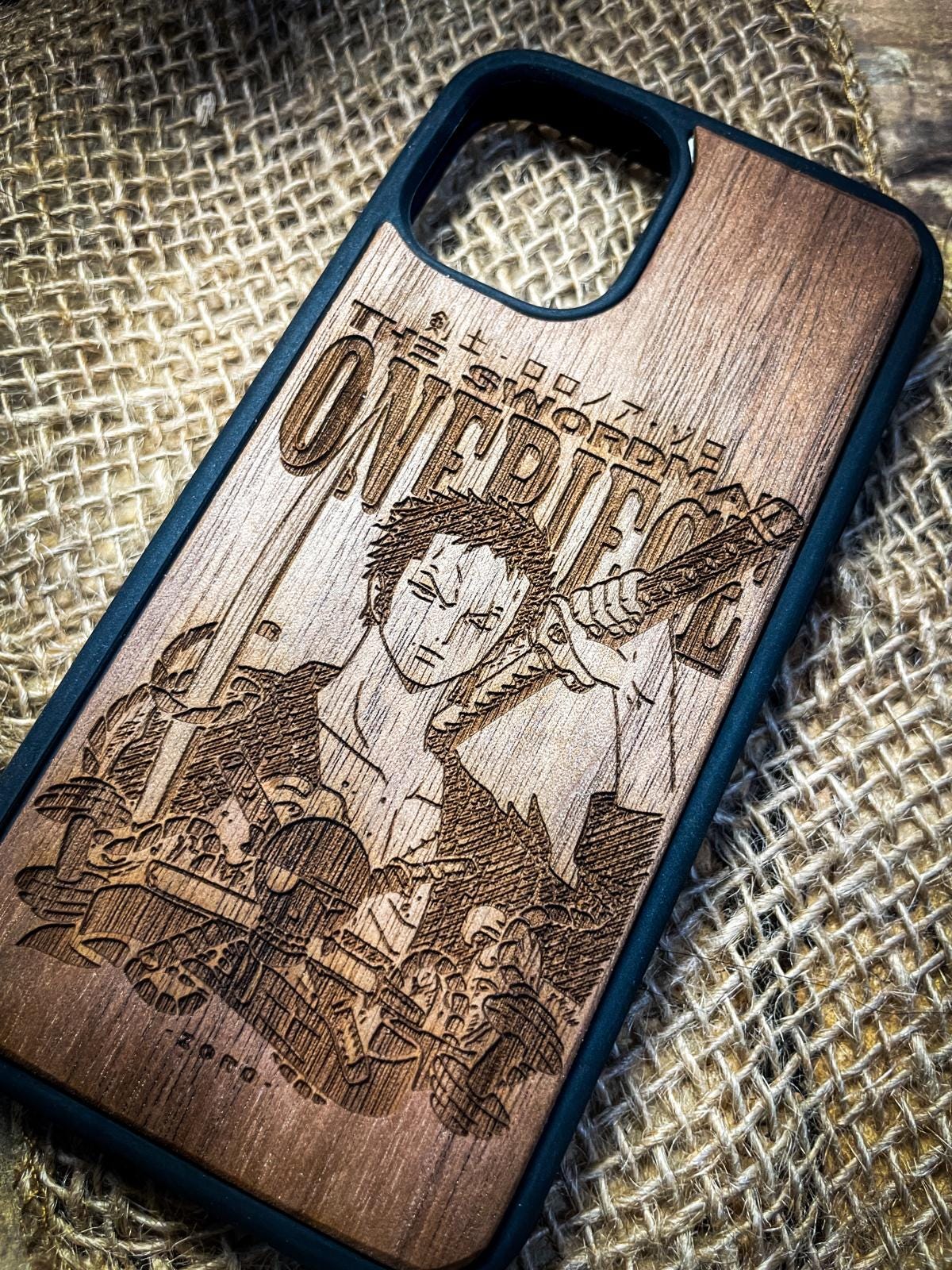 a wooden phone case with a picture of a man on it