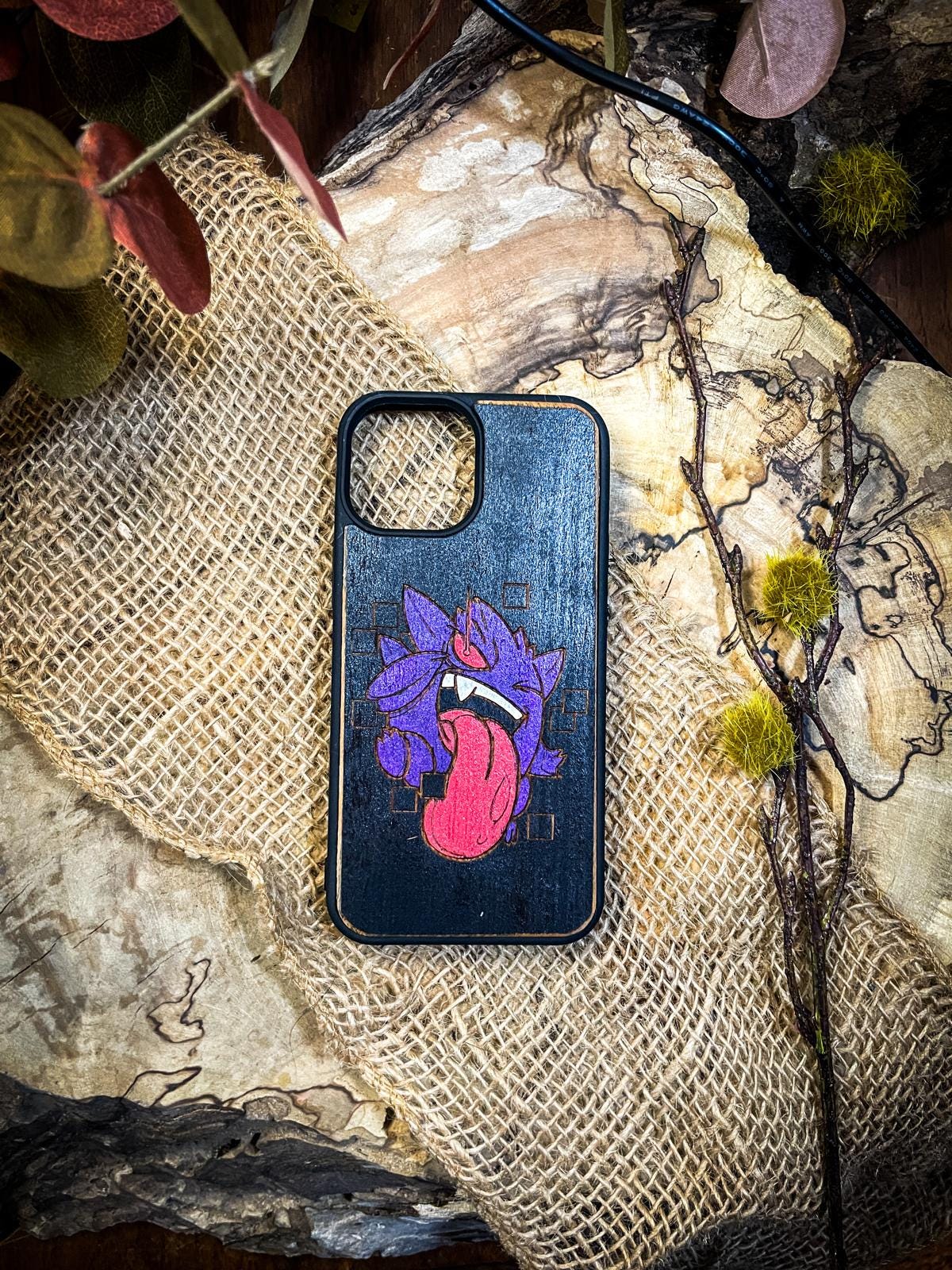 a phone case with a picture of a heart on it