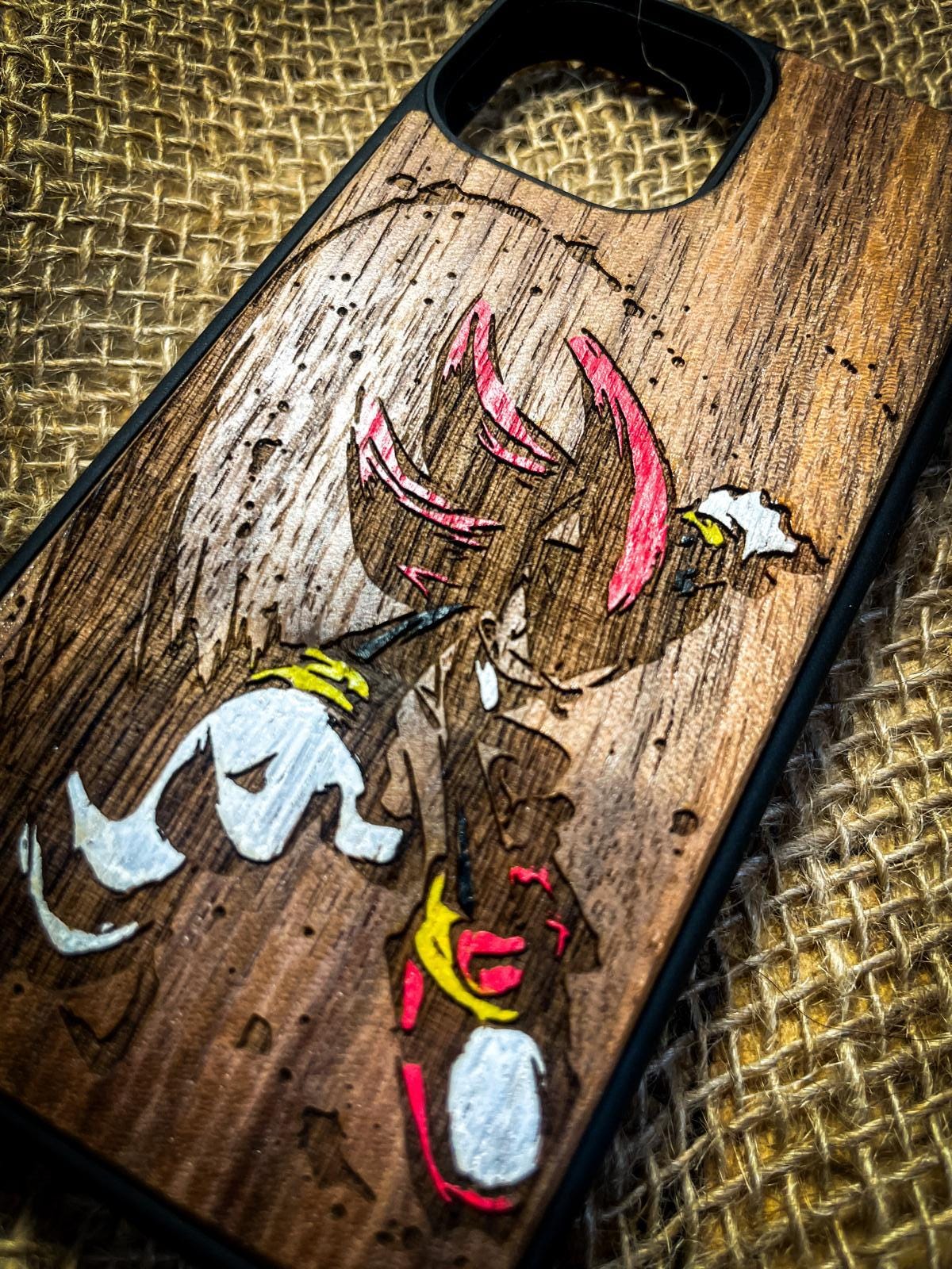 a wooden case with a picture of a bird on it