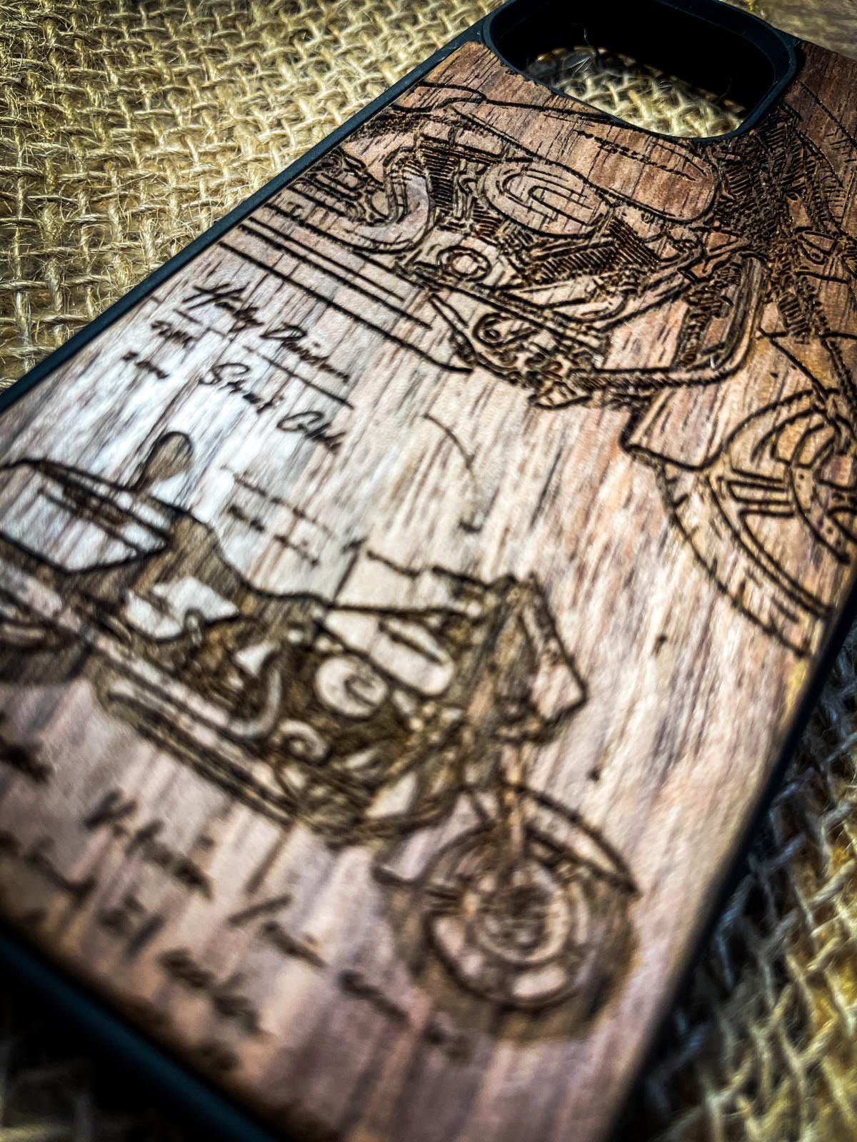 a wooden phone case with a picture of a motorcycle