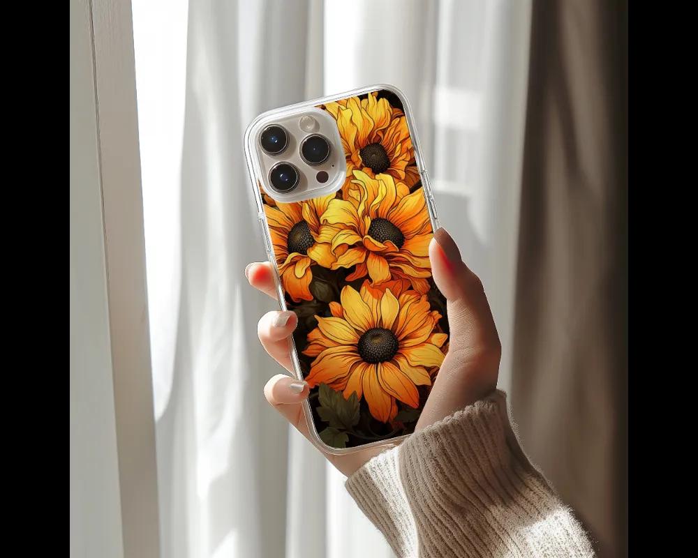 a woman holding a phone case with sunflowers on it