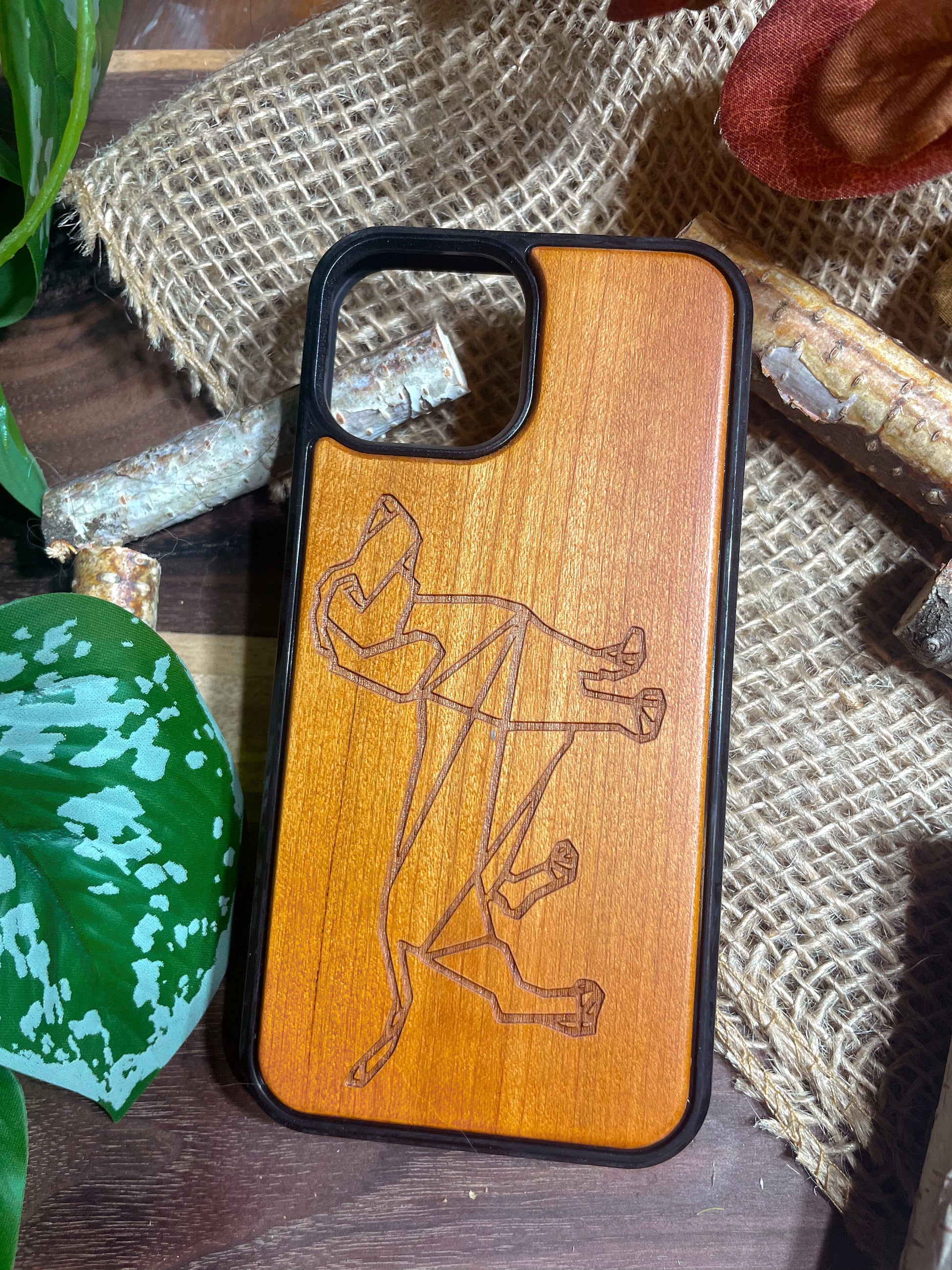 a cell phone case with a wooden back and sides