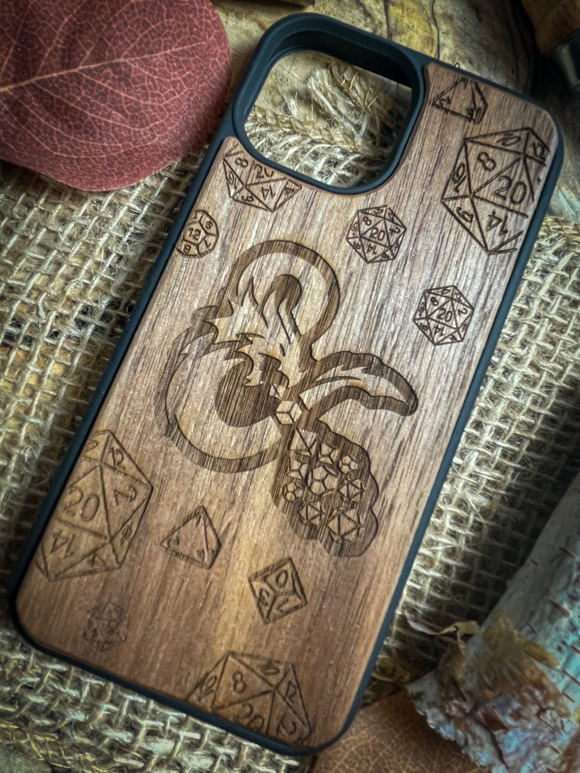 a wooden phone case with a design on it