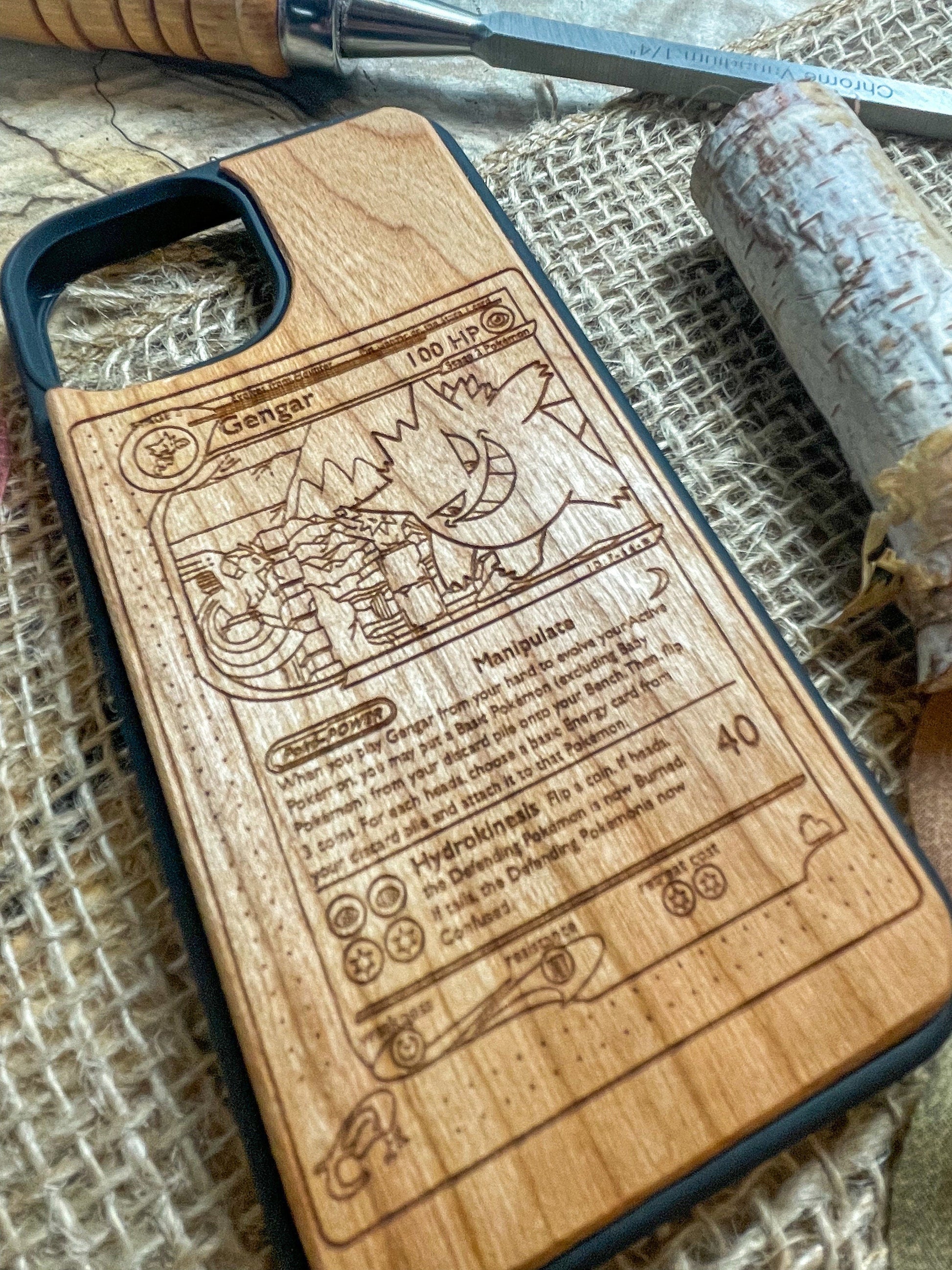 a wooden phone case with a cartoon character on it