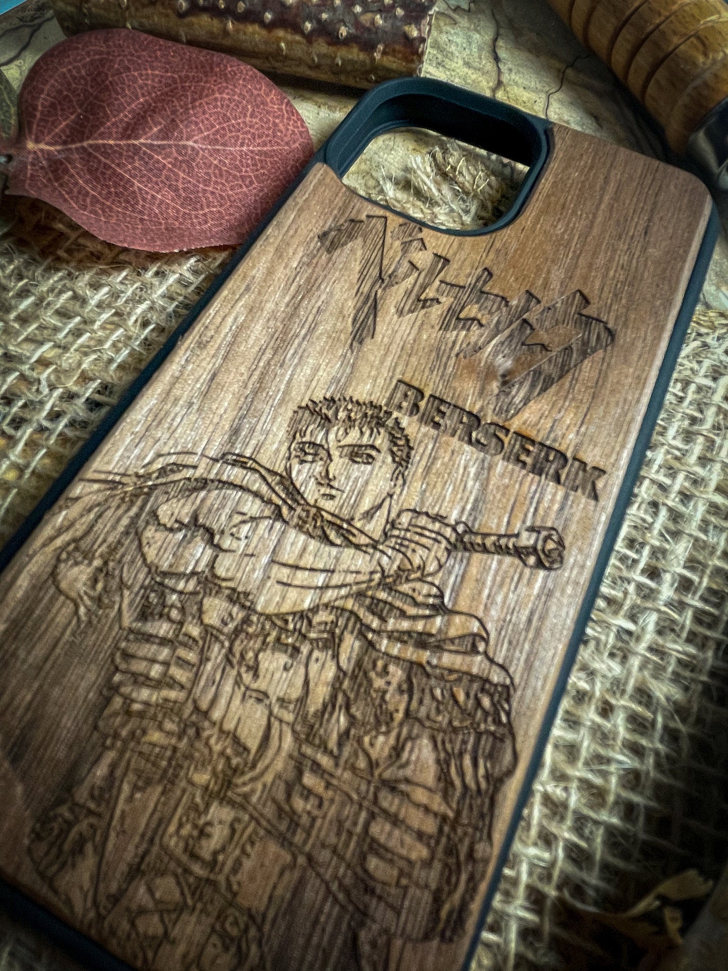 a wooden phone case with a picture of a man on it