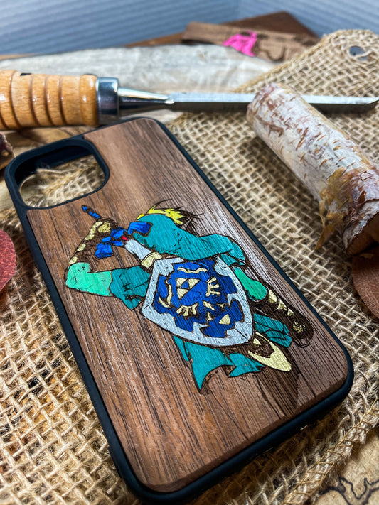 a wooden phone case with a picture of a knight on it