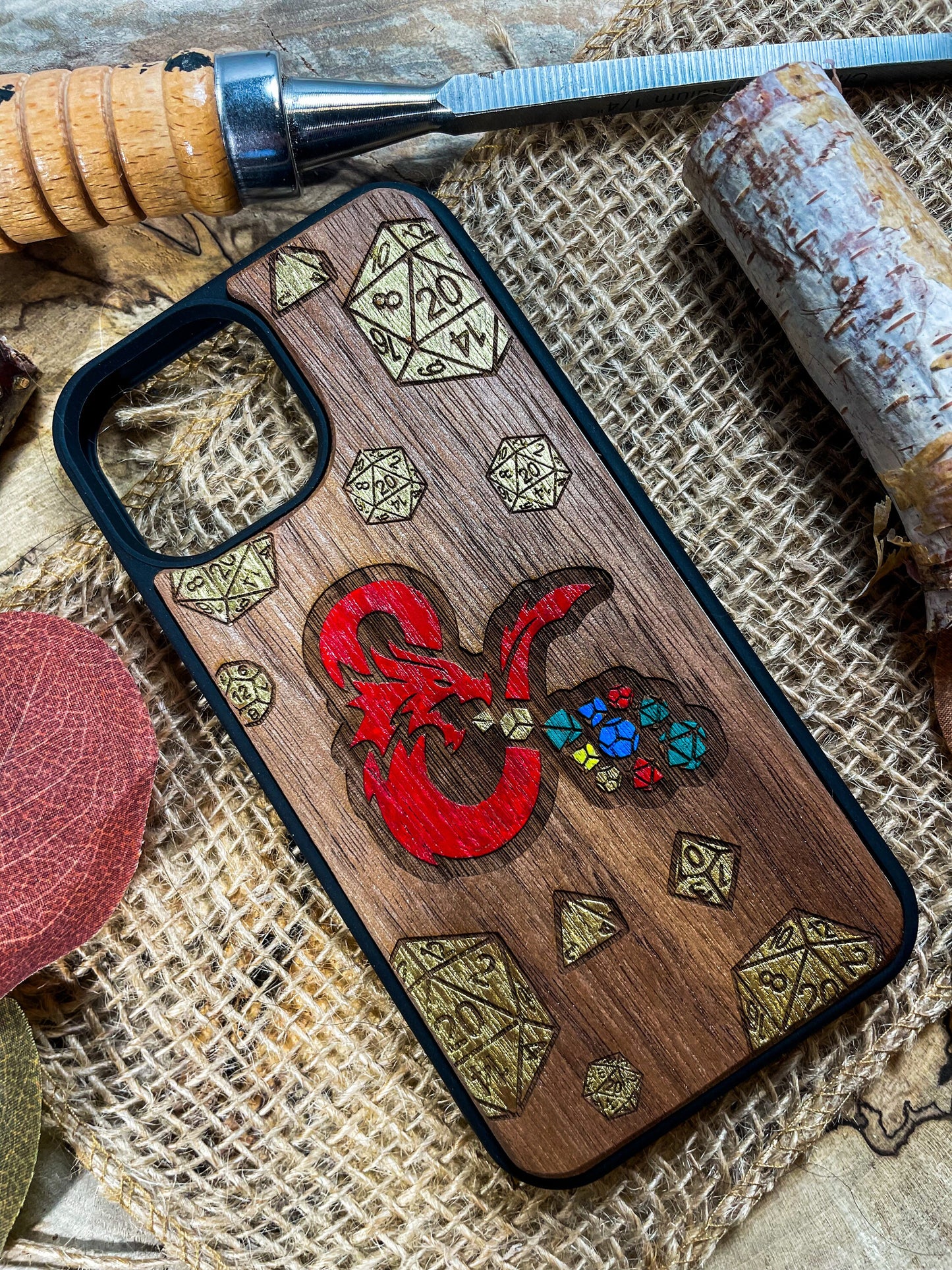 a wooden phone case with a picture of a dragon on it