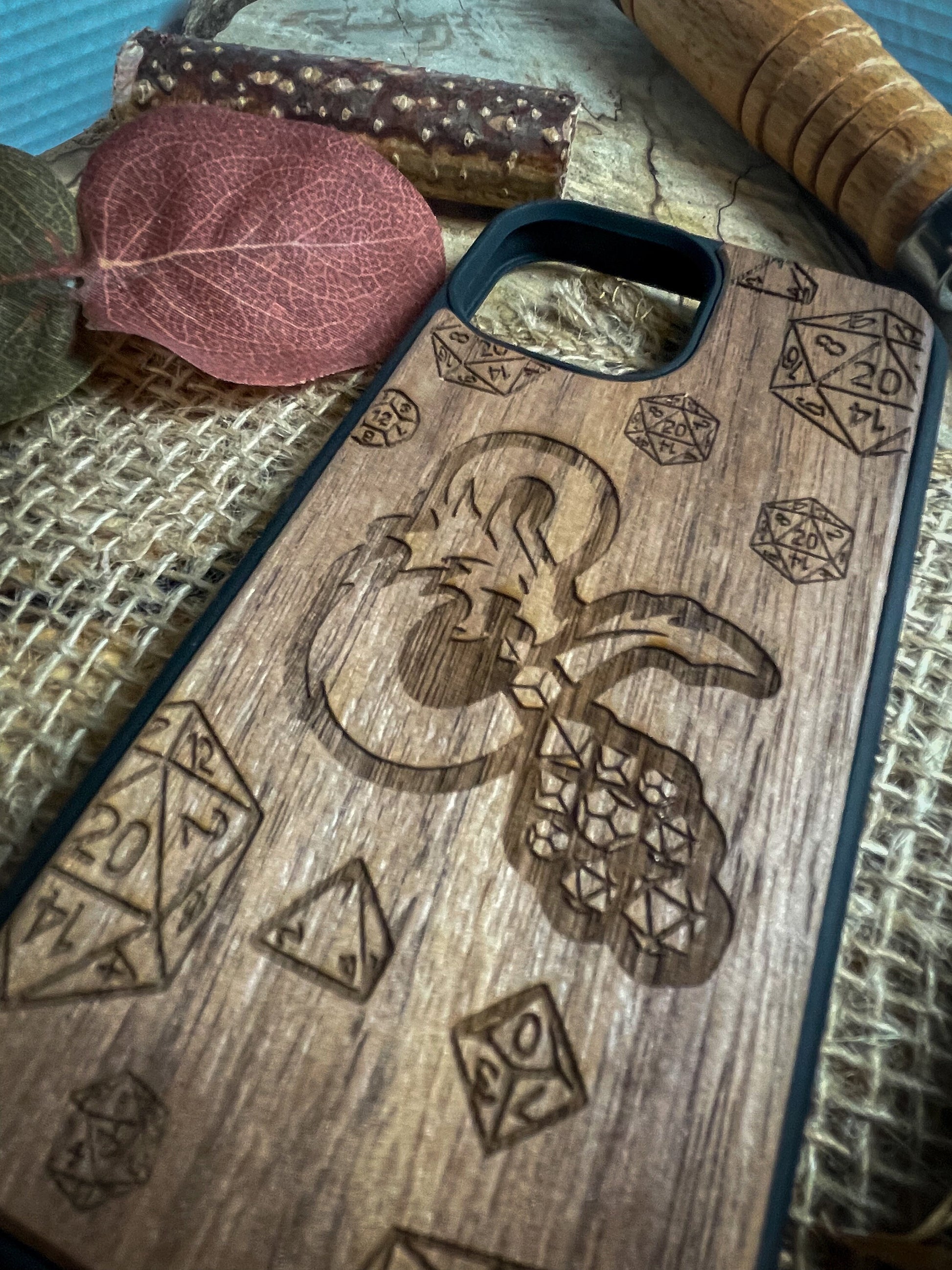 a wooden phone case with a design on it