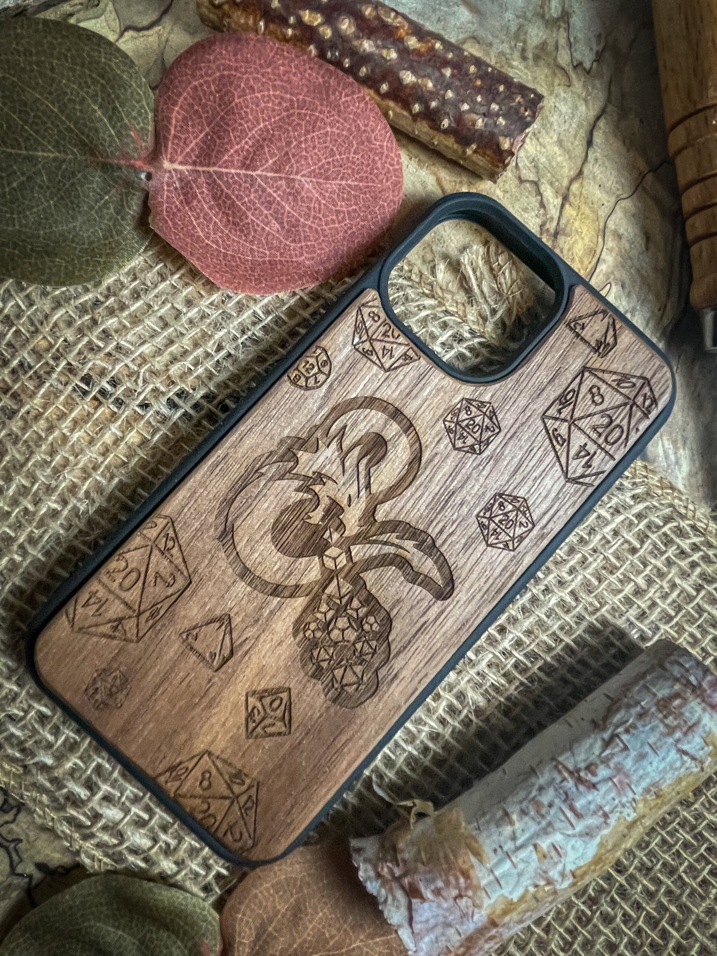 a wooden phone case sitting on top of a table