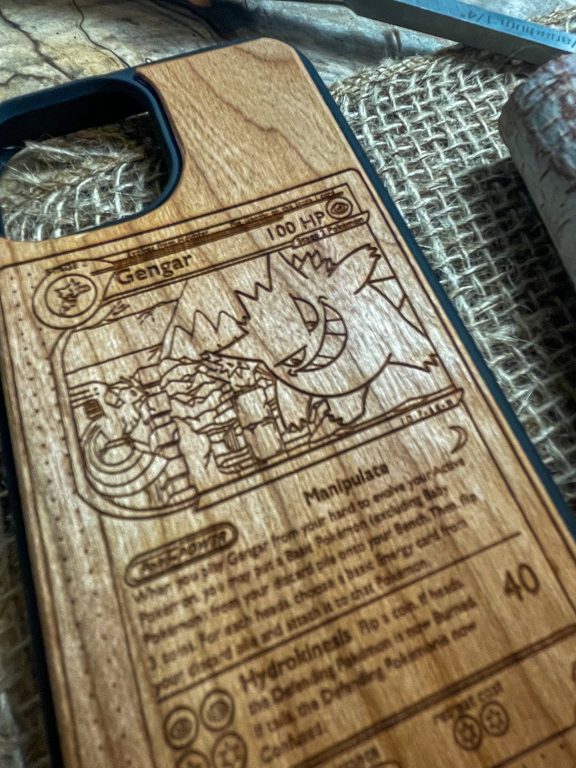 a wooden phone case with a picture of a cartoon character on it