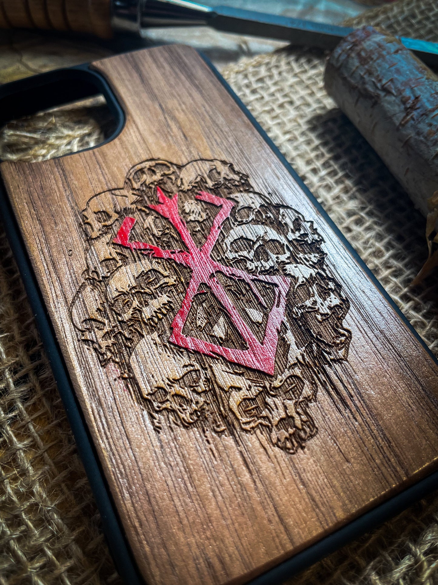 a wooden phone case with a design on it