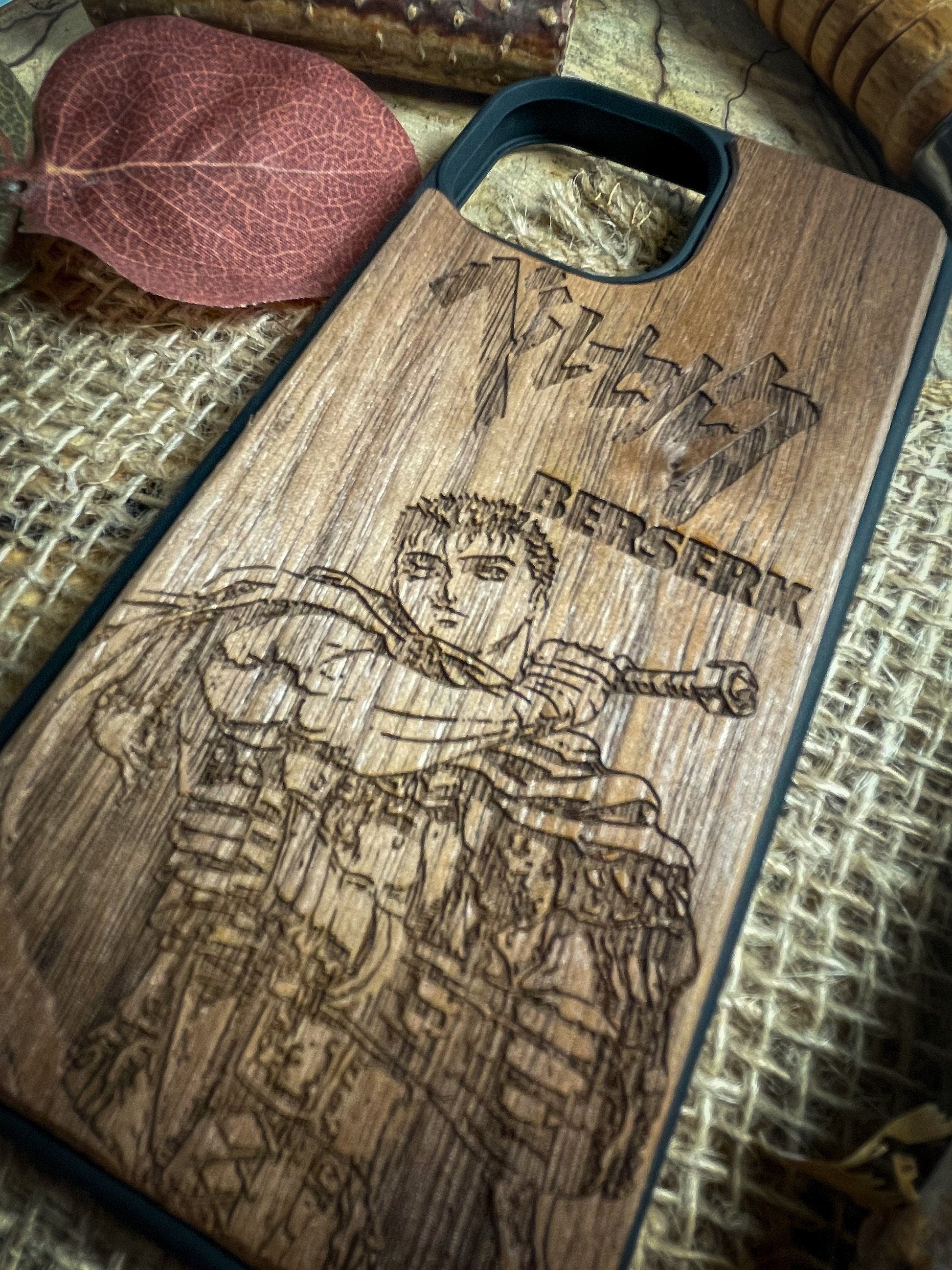 a wooden phone case with a picture of a man on it