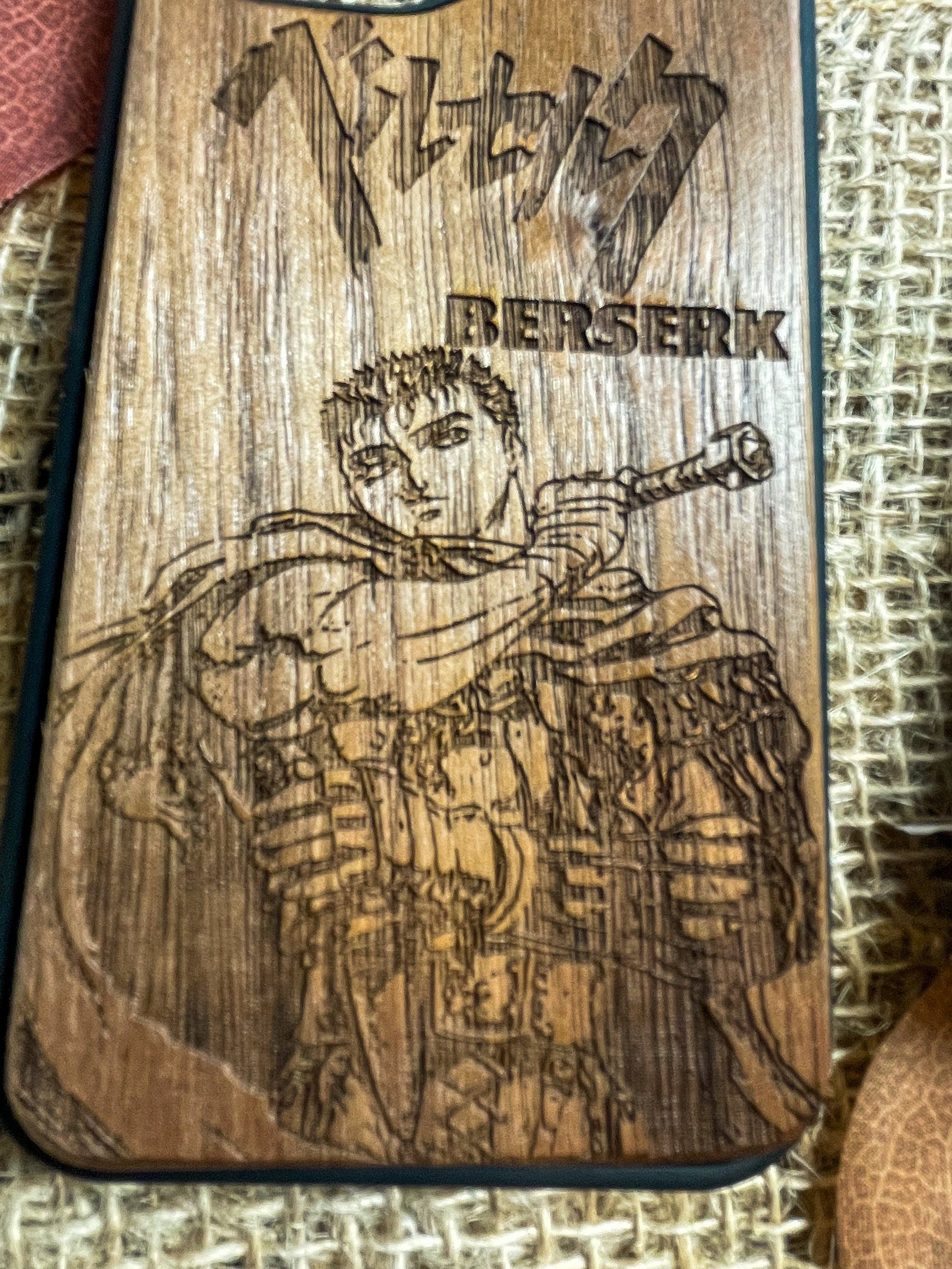 a wooden case with a picture of a man holding a baseball bat