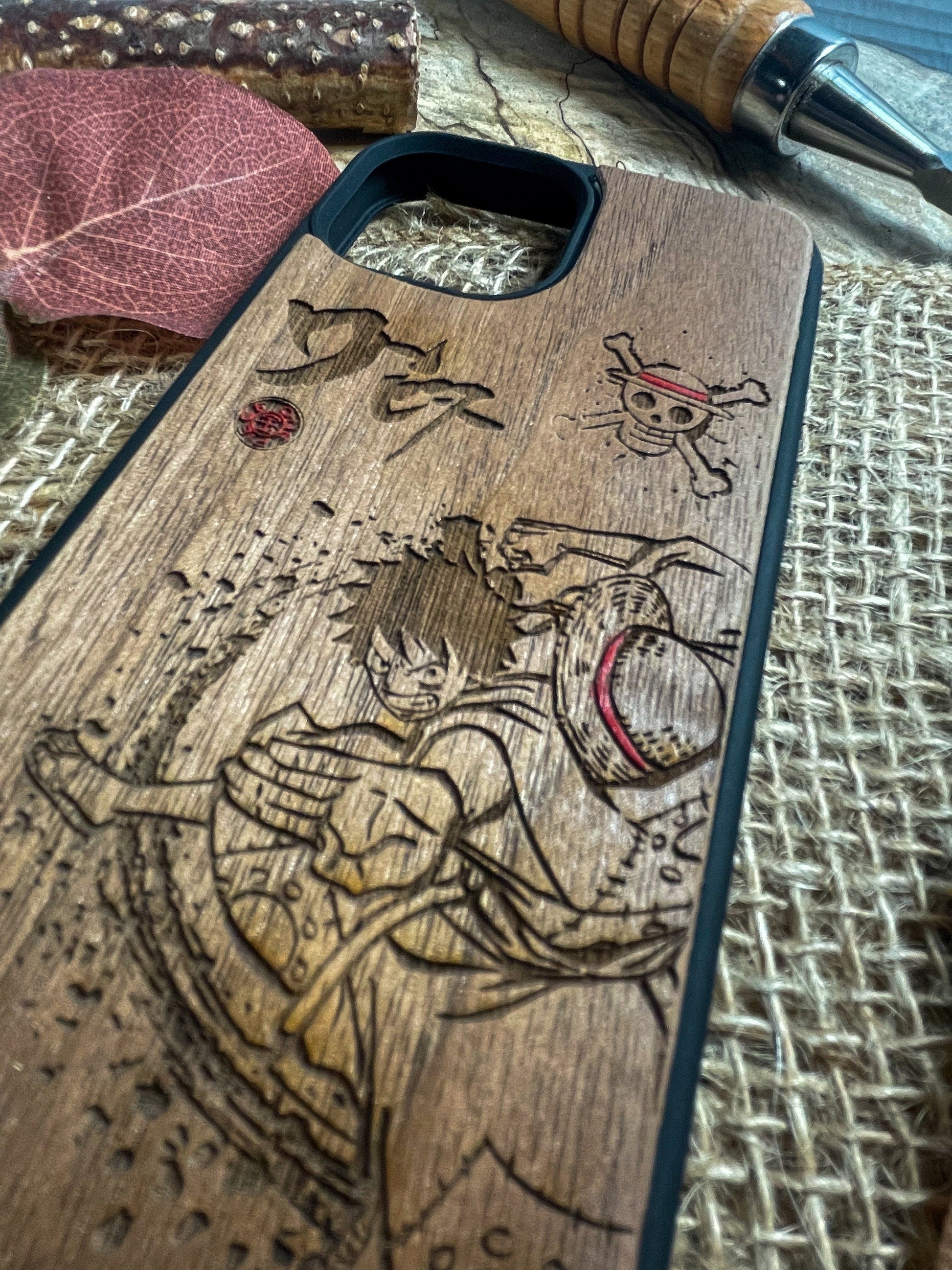 a wooden phone case with a picture of a woman on it