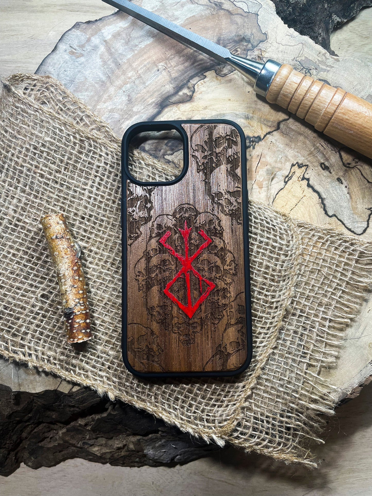 a wooden phone case with a design on it