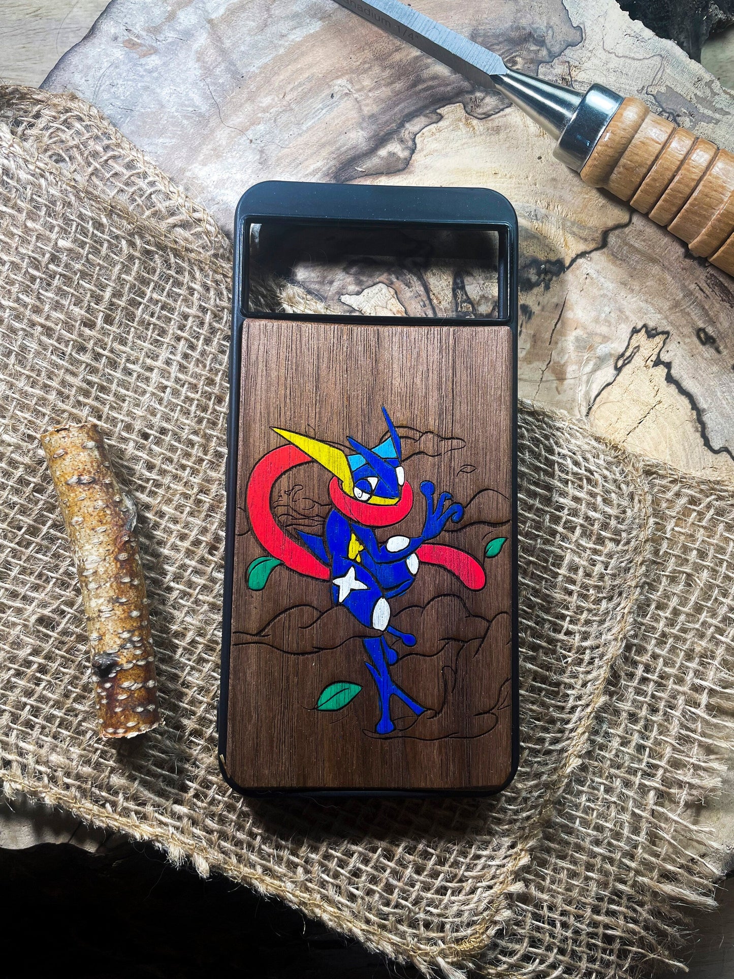 a wooden phone case with a picture of a cartoon character on it