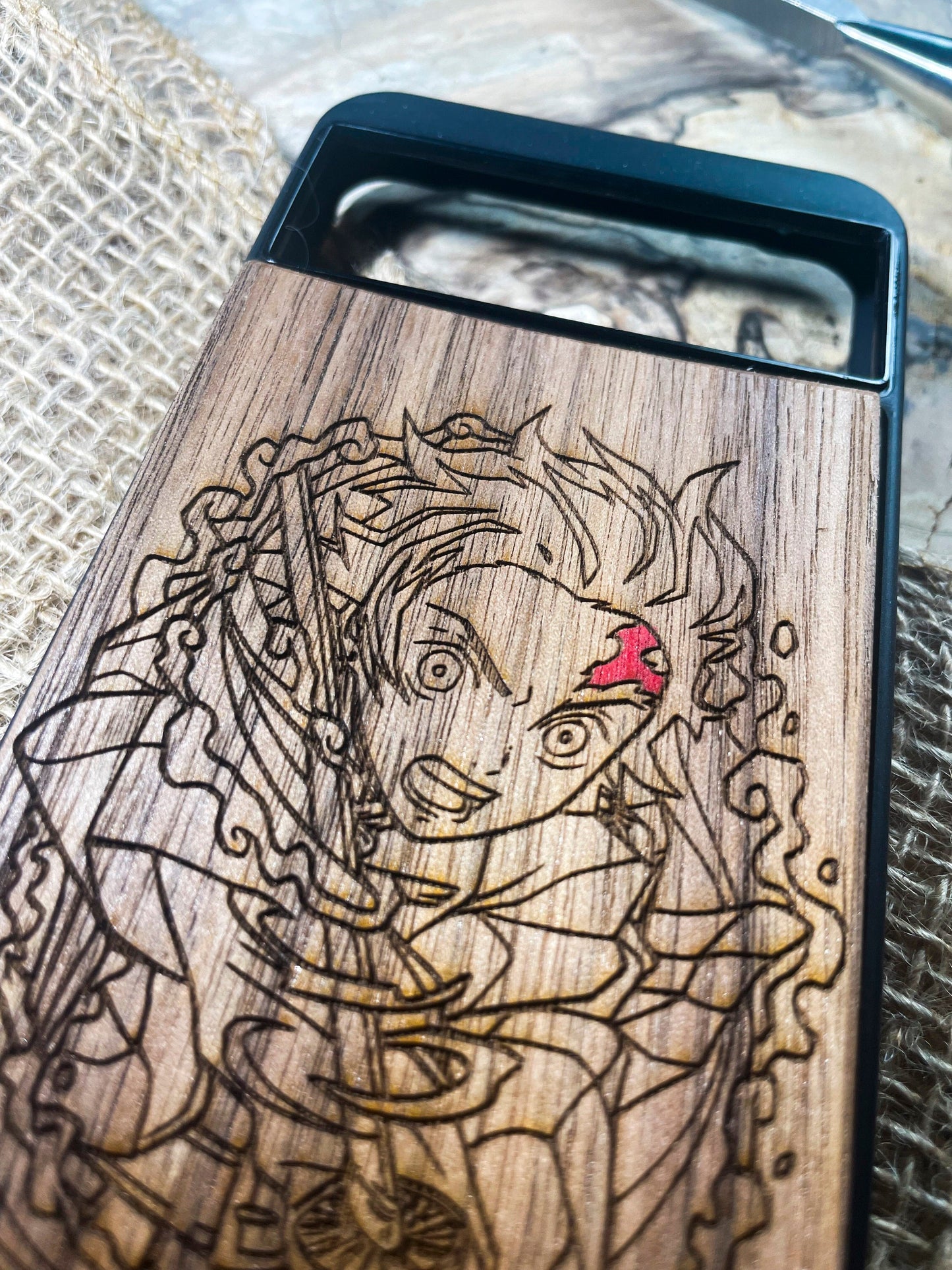 a wooden case with a picture of a woman on it