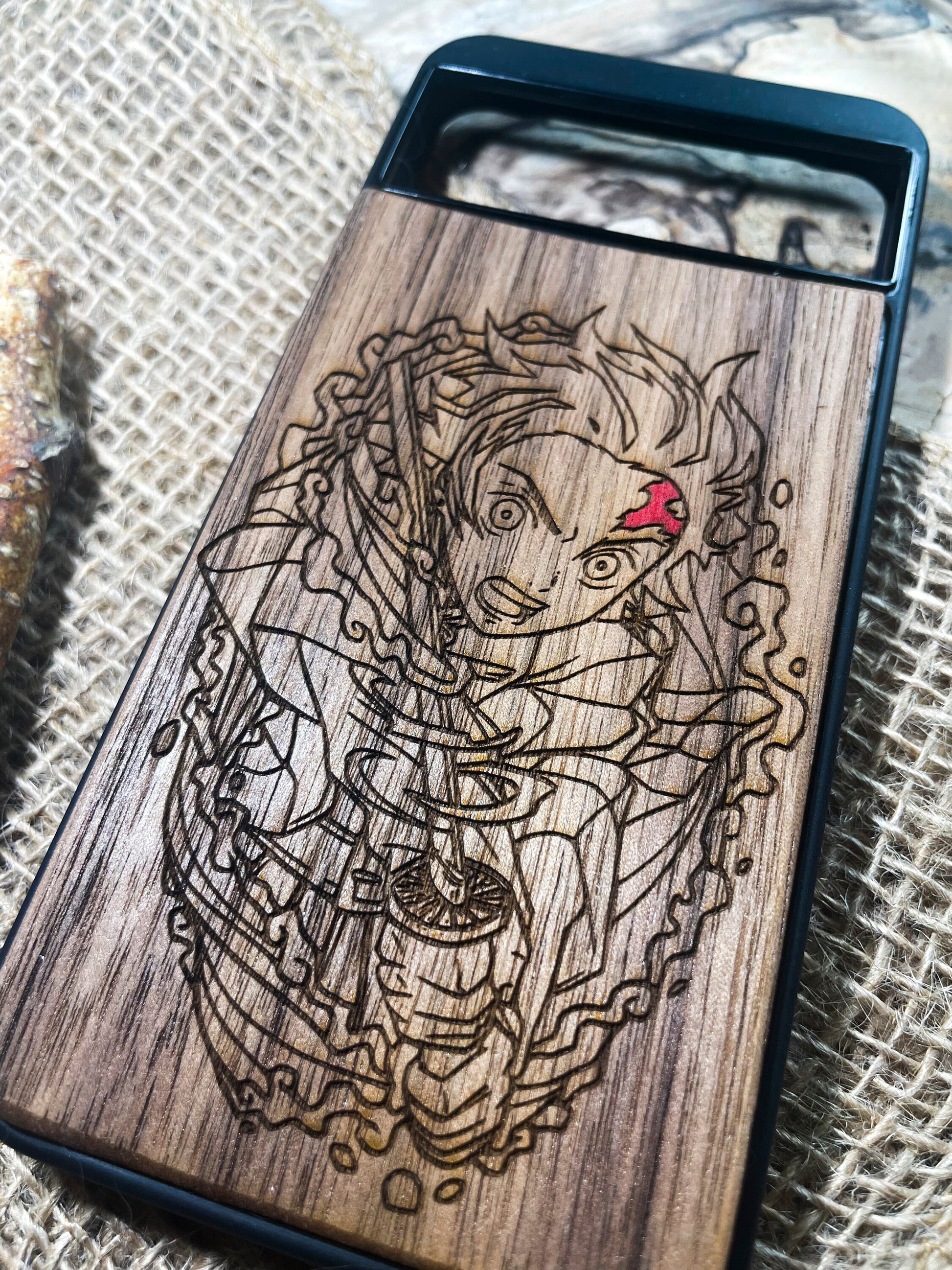 a wooden case with a picture of a woman on it