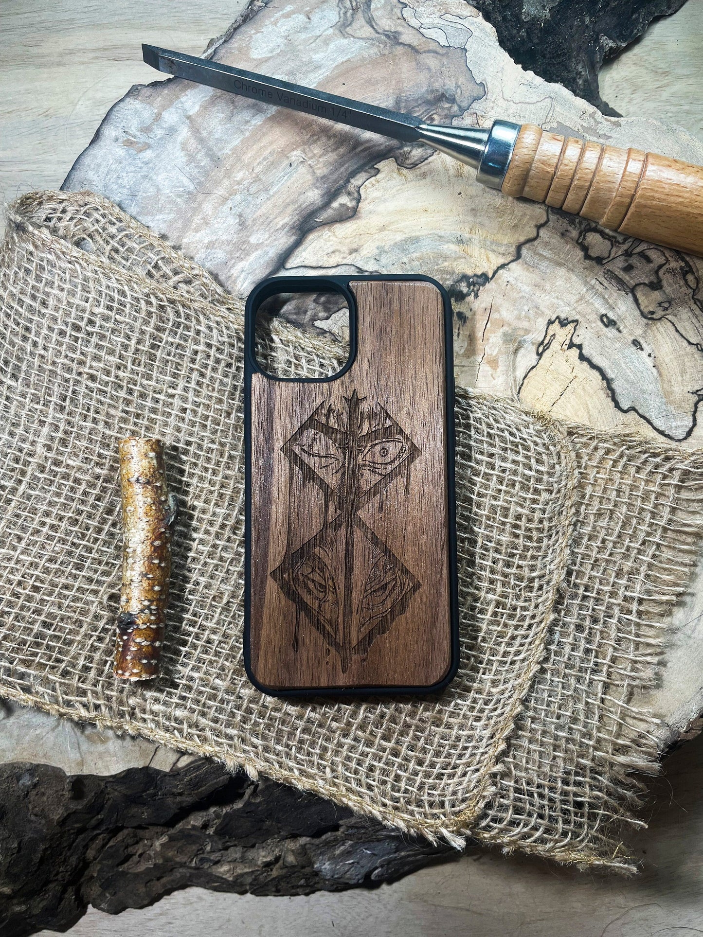 a wooden phone case with a design on it