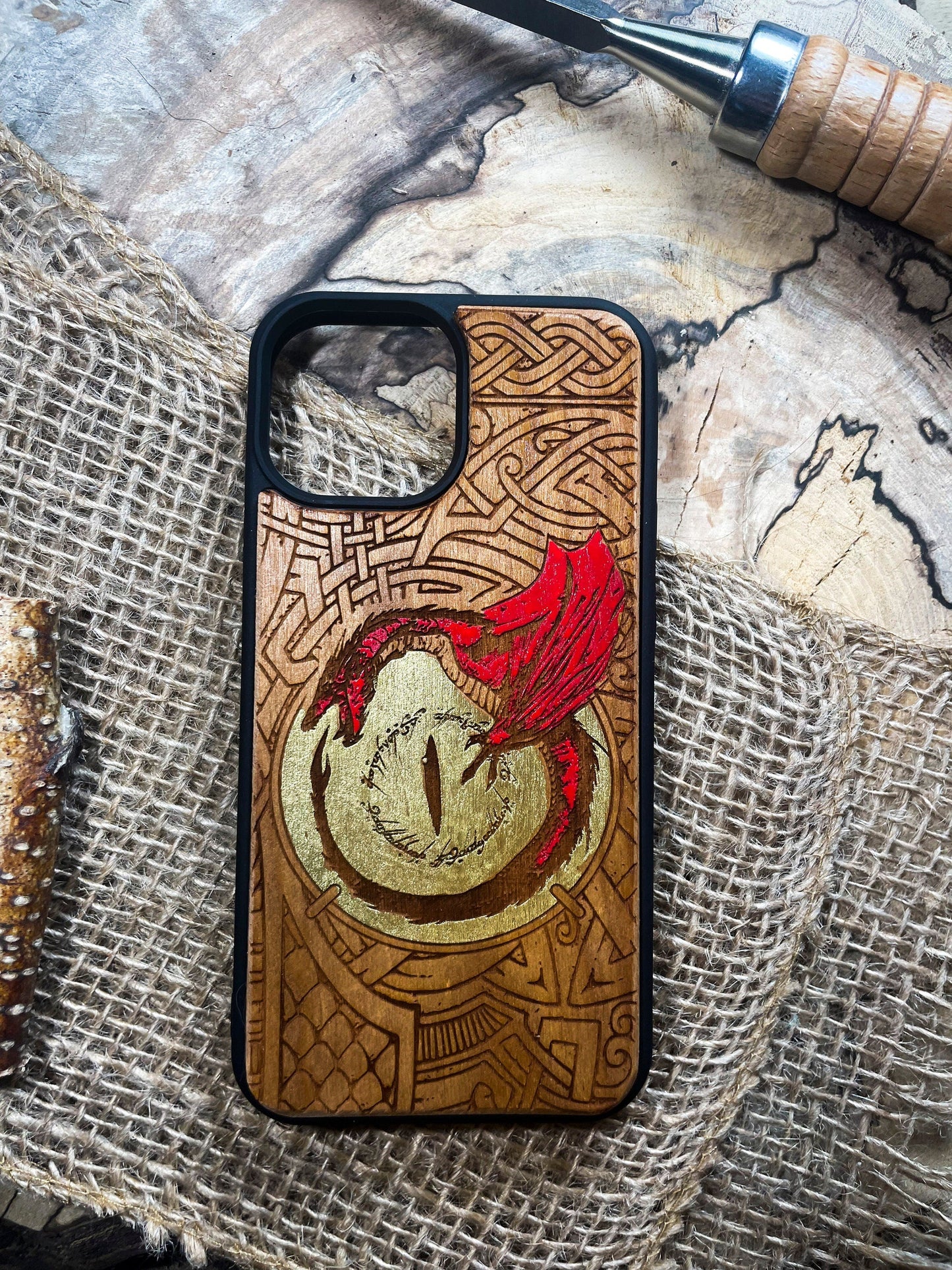 a phone case with a picture of a dragon on it