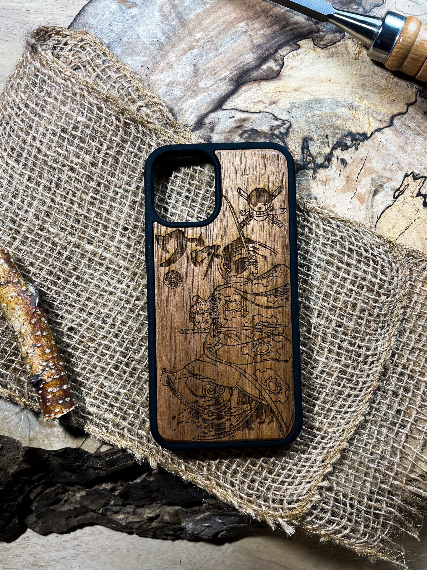 a wooden phone case sitting on top of a table