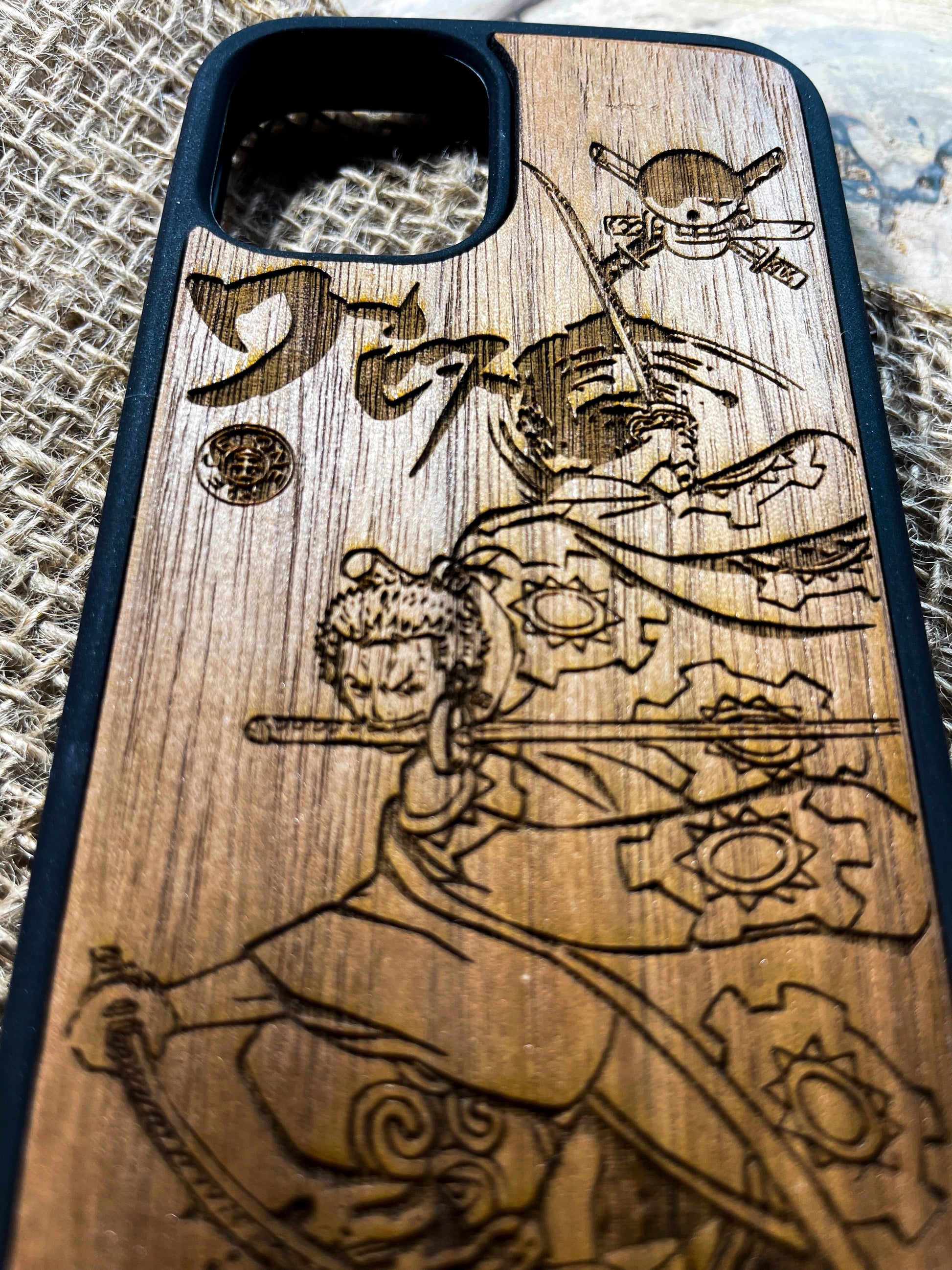 a wooden phone case with a picture of a man on a motorcycle