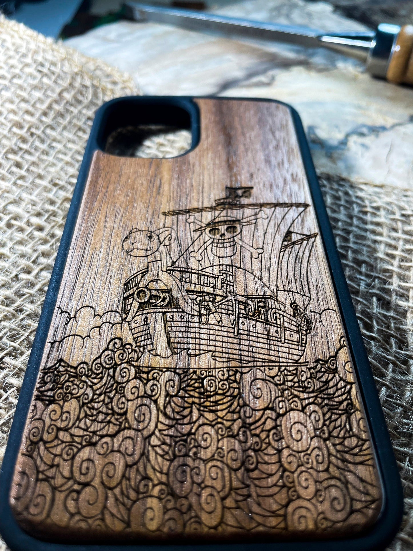 a wooden case with a picture of a ship on it