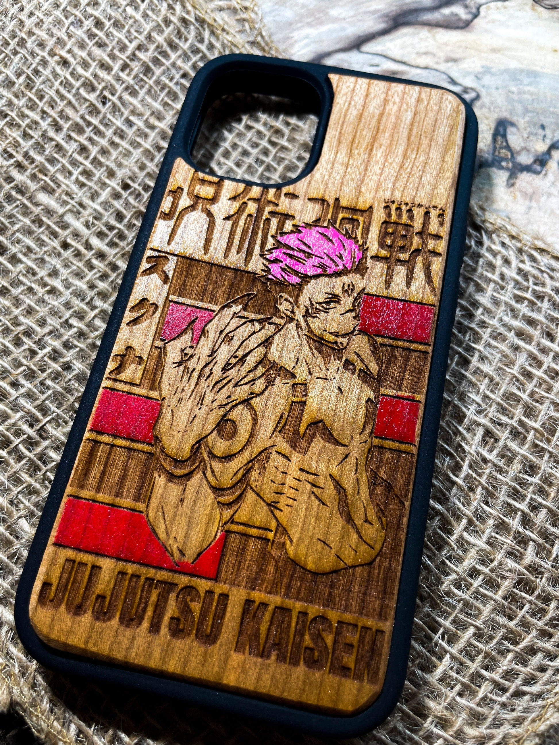 a wooden phone case with a picture of a person on it