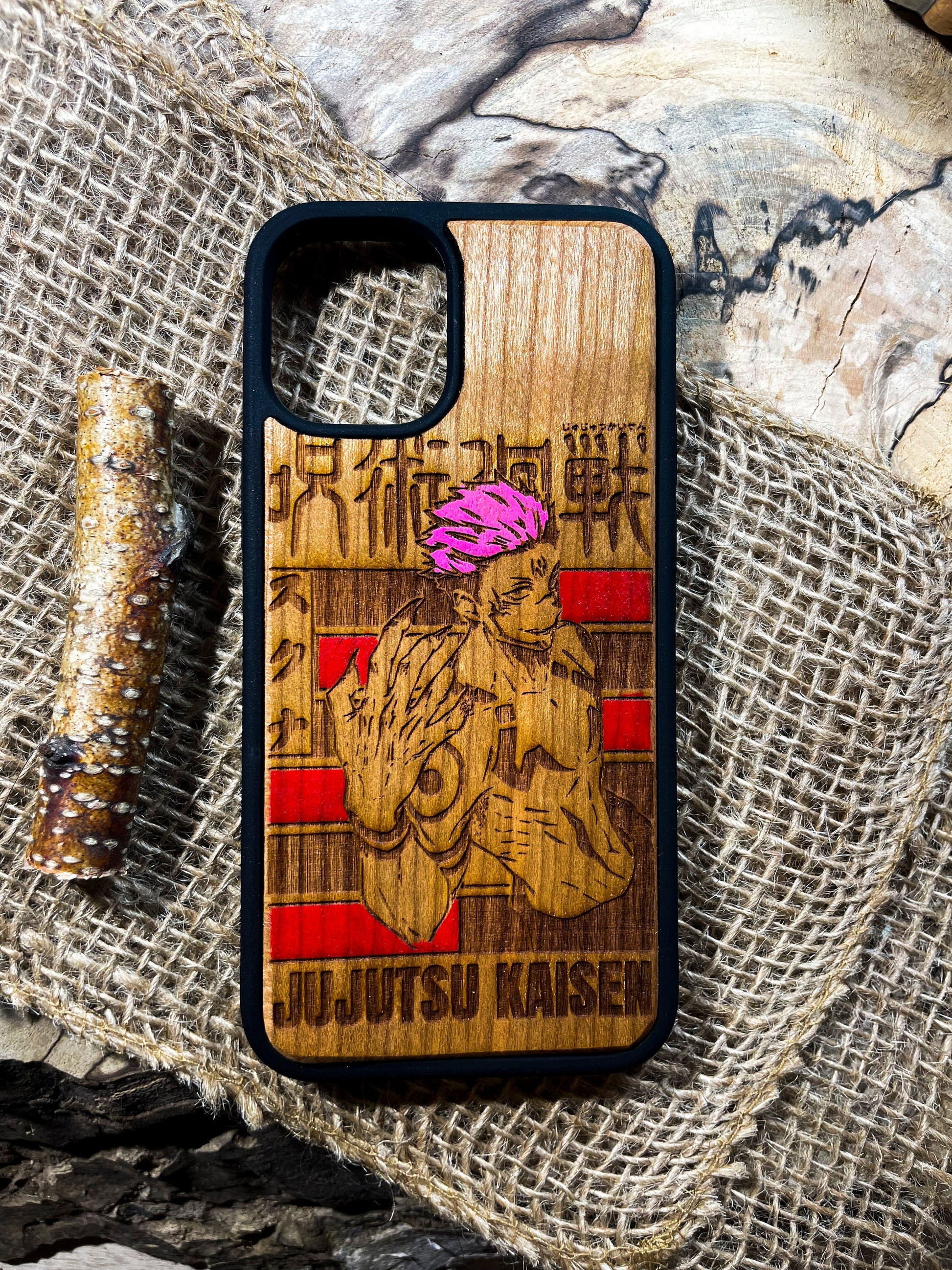 a wooden phone case with a picture of a horse on it