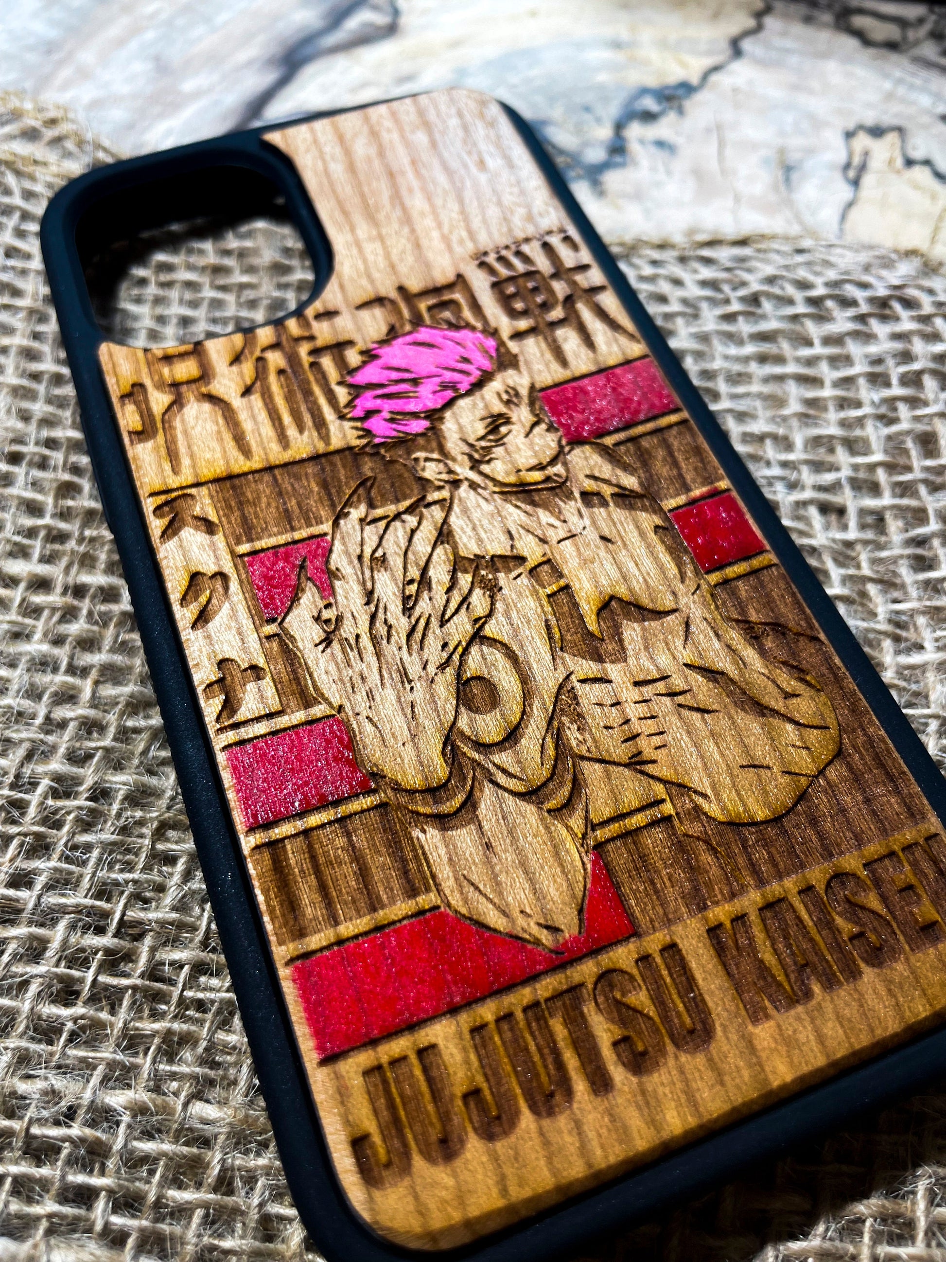 a wooden phone case with a picture of a man on it