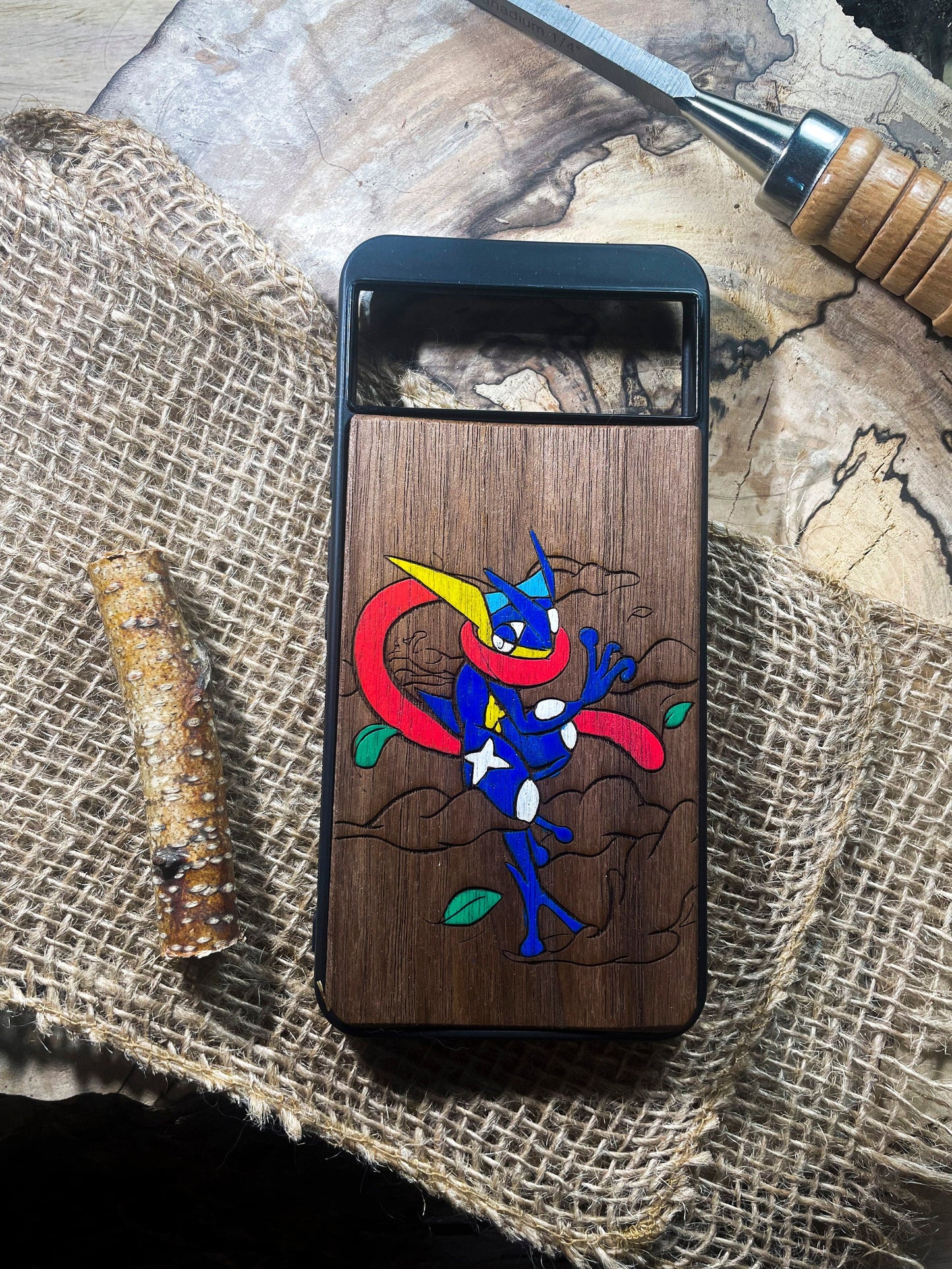 a wooden phone case with a picture of a cartoon character on it