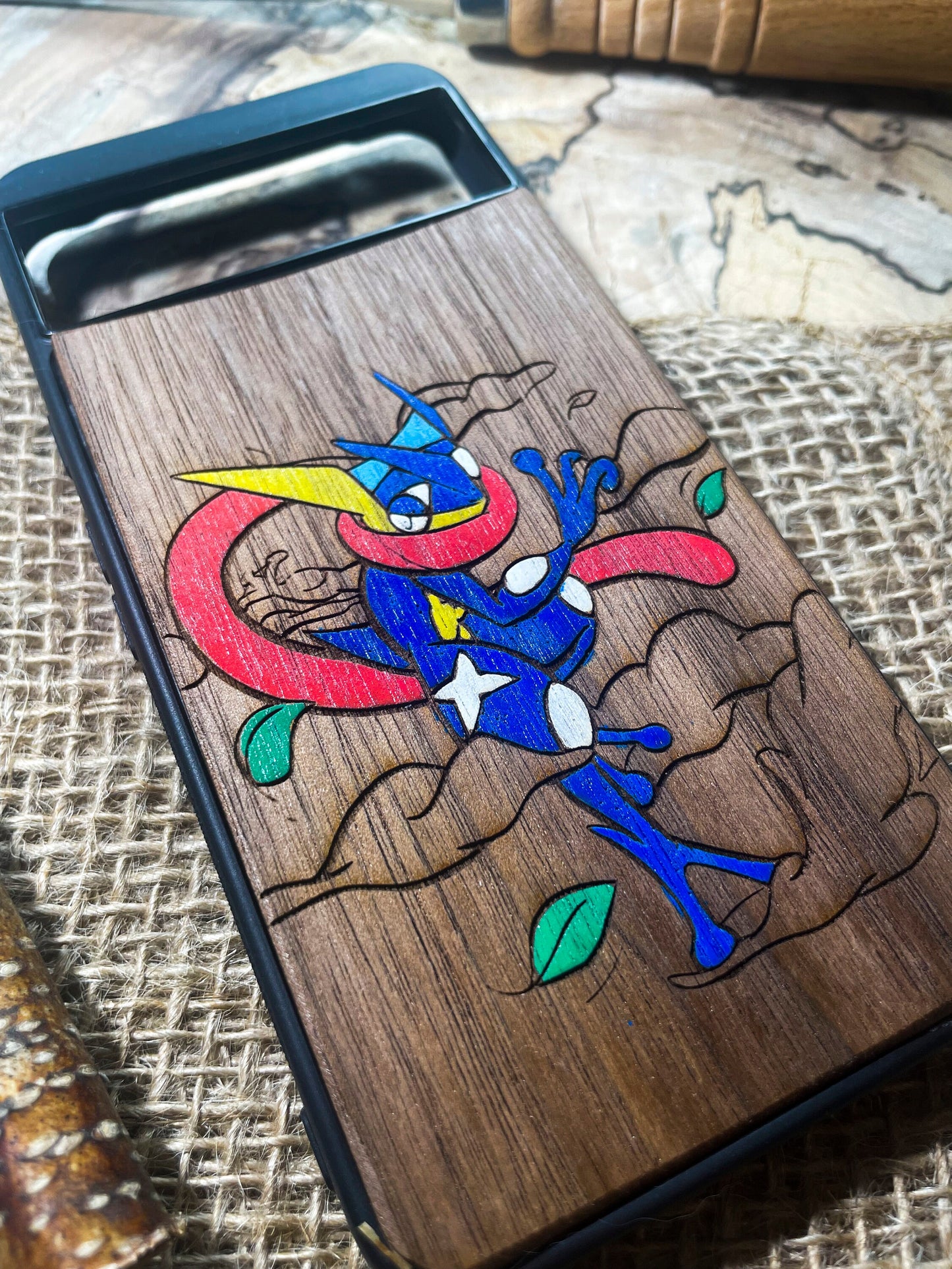 a wooden phone case with a picture of a cartoon character on it