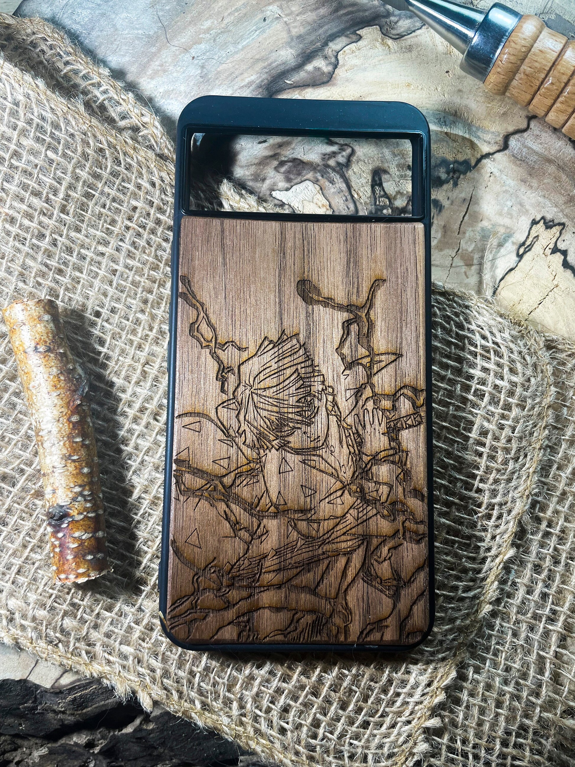 a wooden phone case with a picture of a man on it