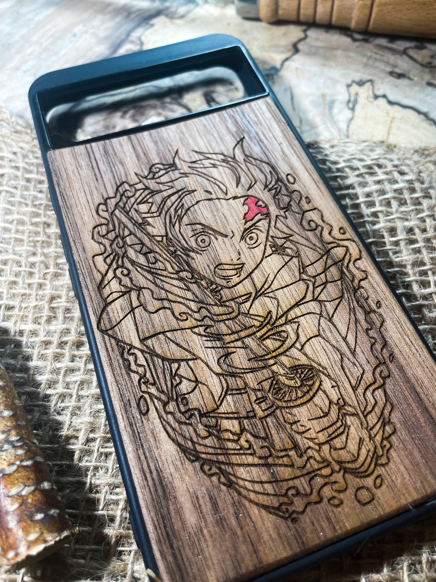 a wooden phone case with a picture of a woman on it