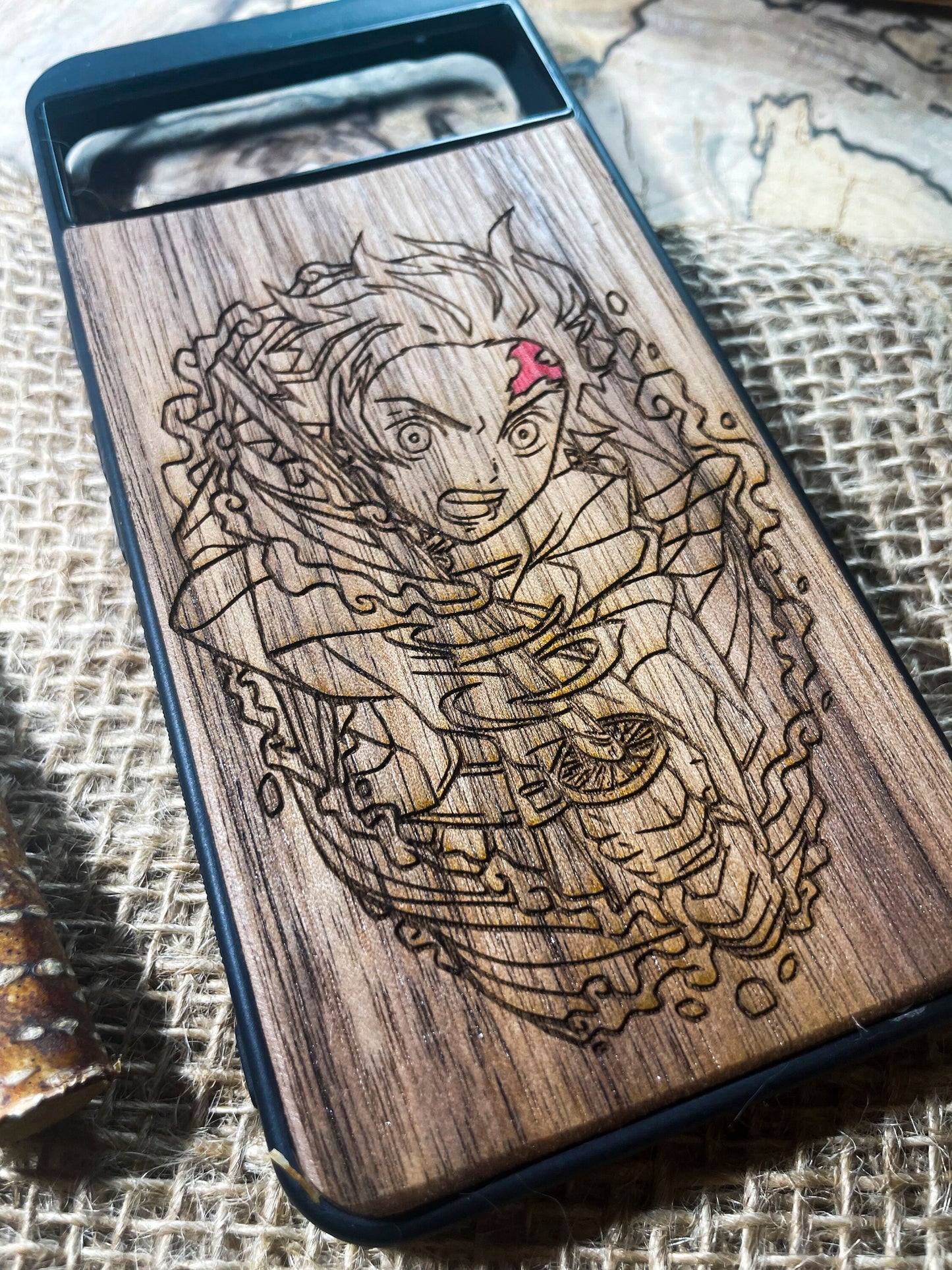 a wooden phone case with a picture of a woman on it