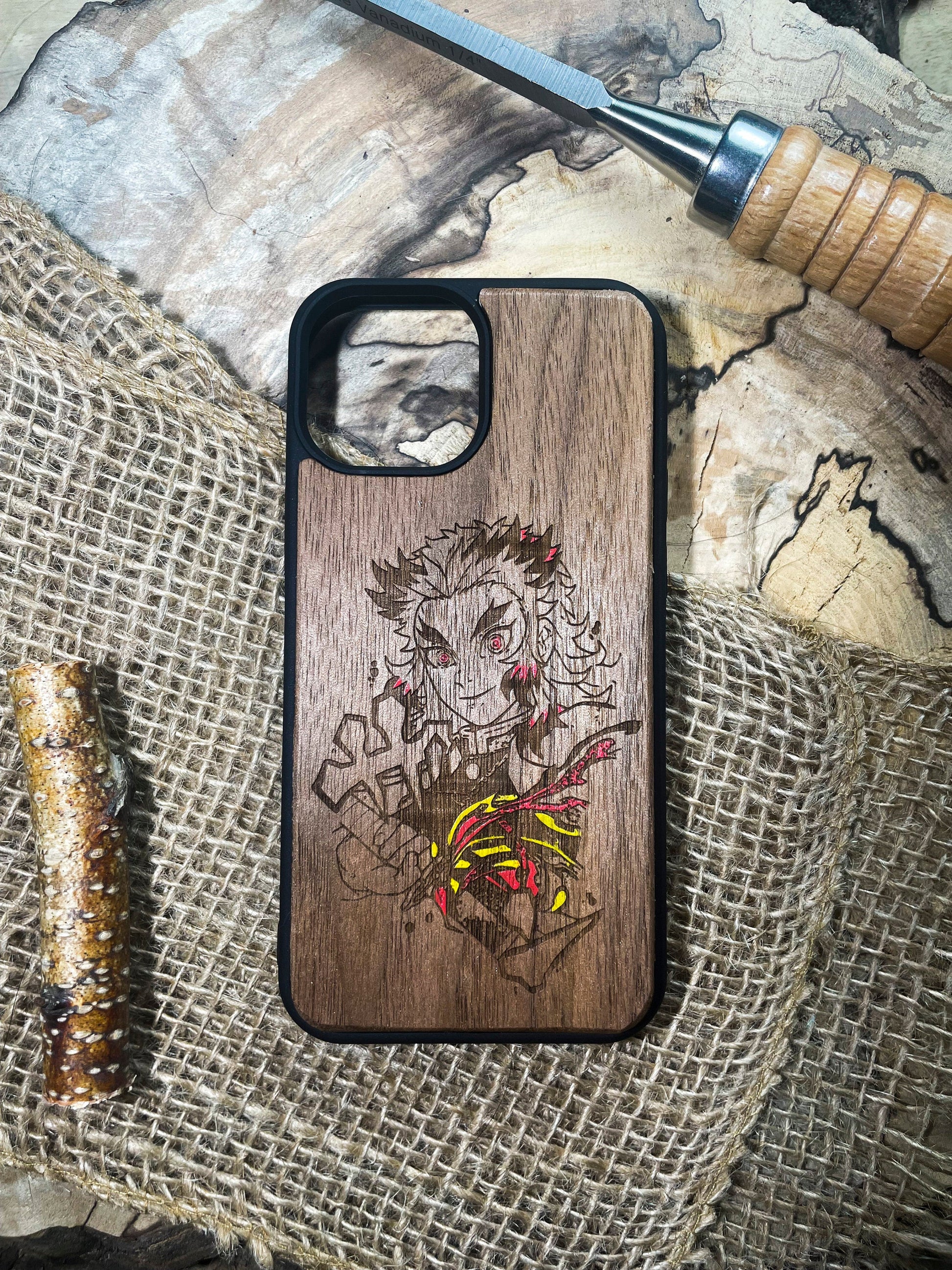 a wooden phone case with a picture of a woman on it