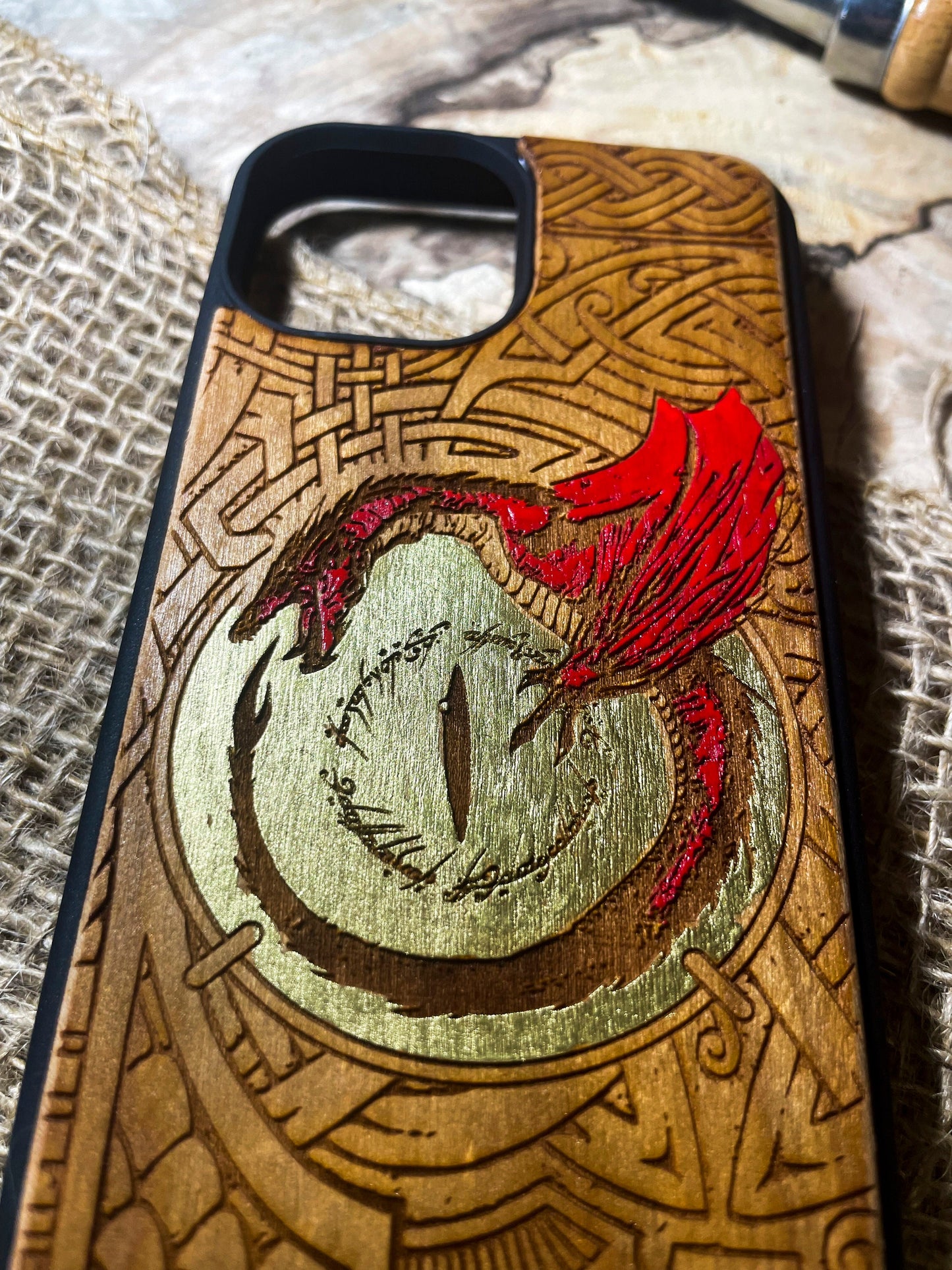 a phone case with a picture of a dragon on it