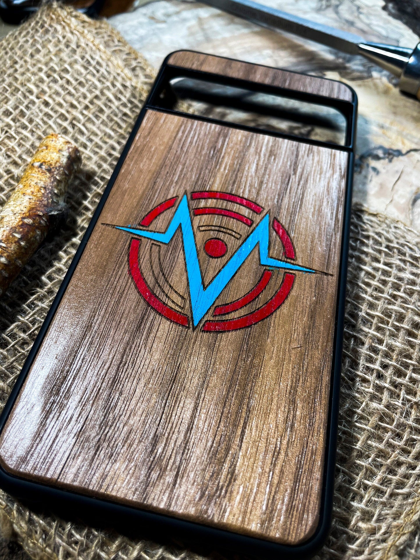 a wooden case with a blue arrow on it