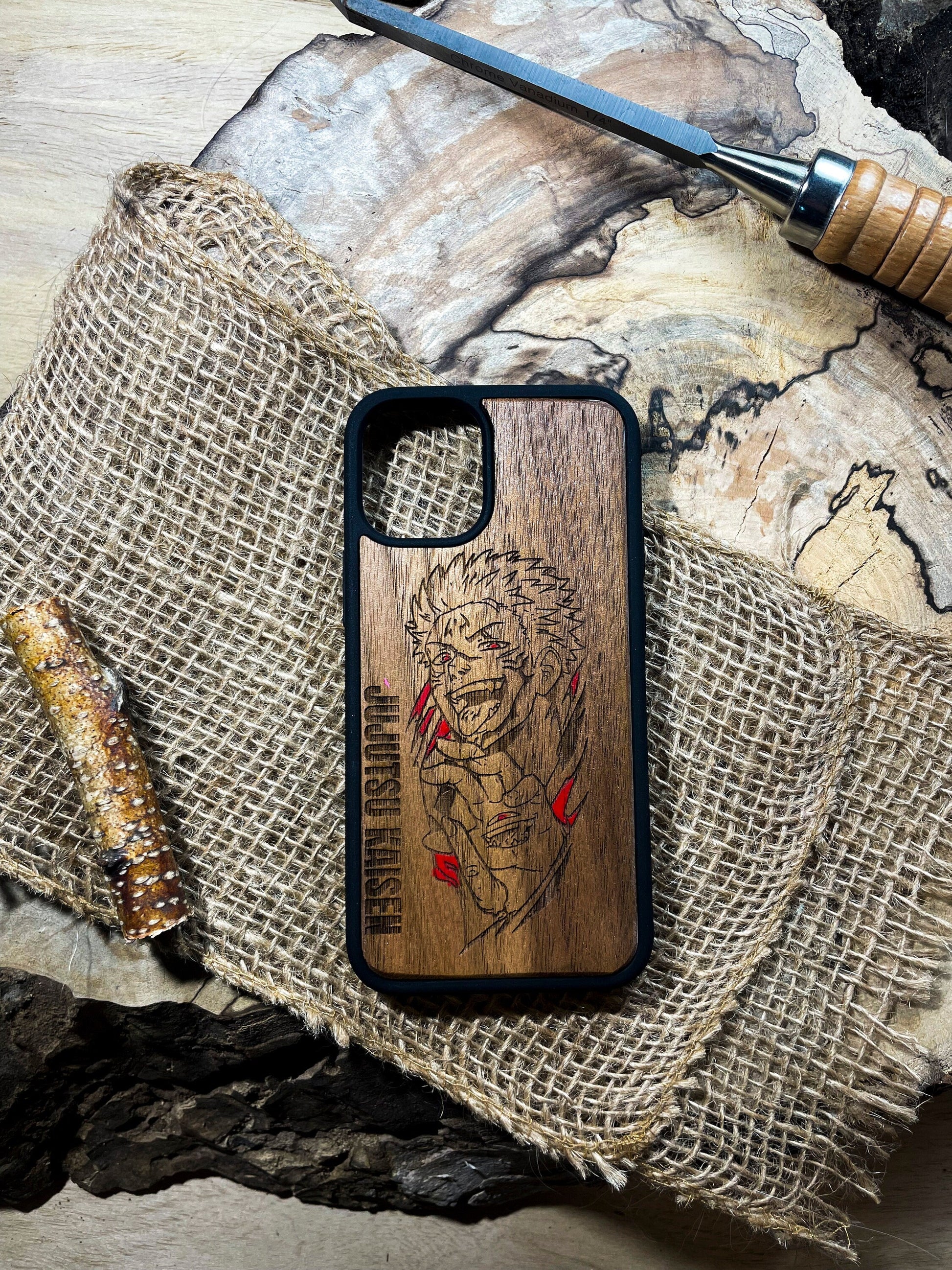 a wooden phone case with a picture of a woman on it